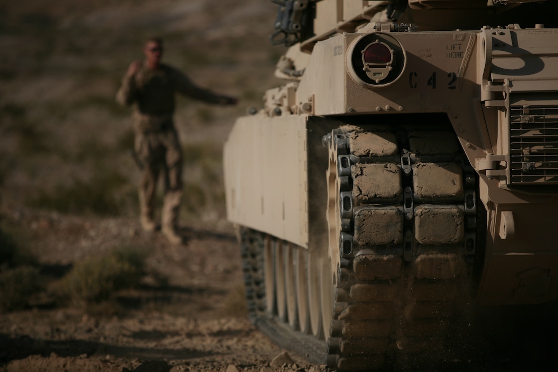 Marines and sailors of Company C, 1st Tank Battalion, conduct a live-fire training exercise at Noble Pass training area April 13 - 18.