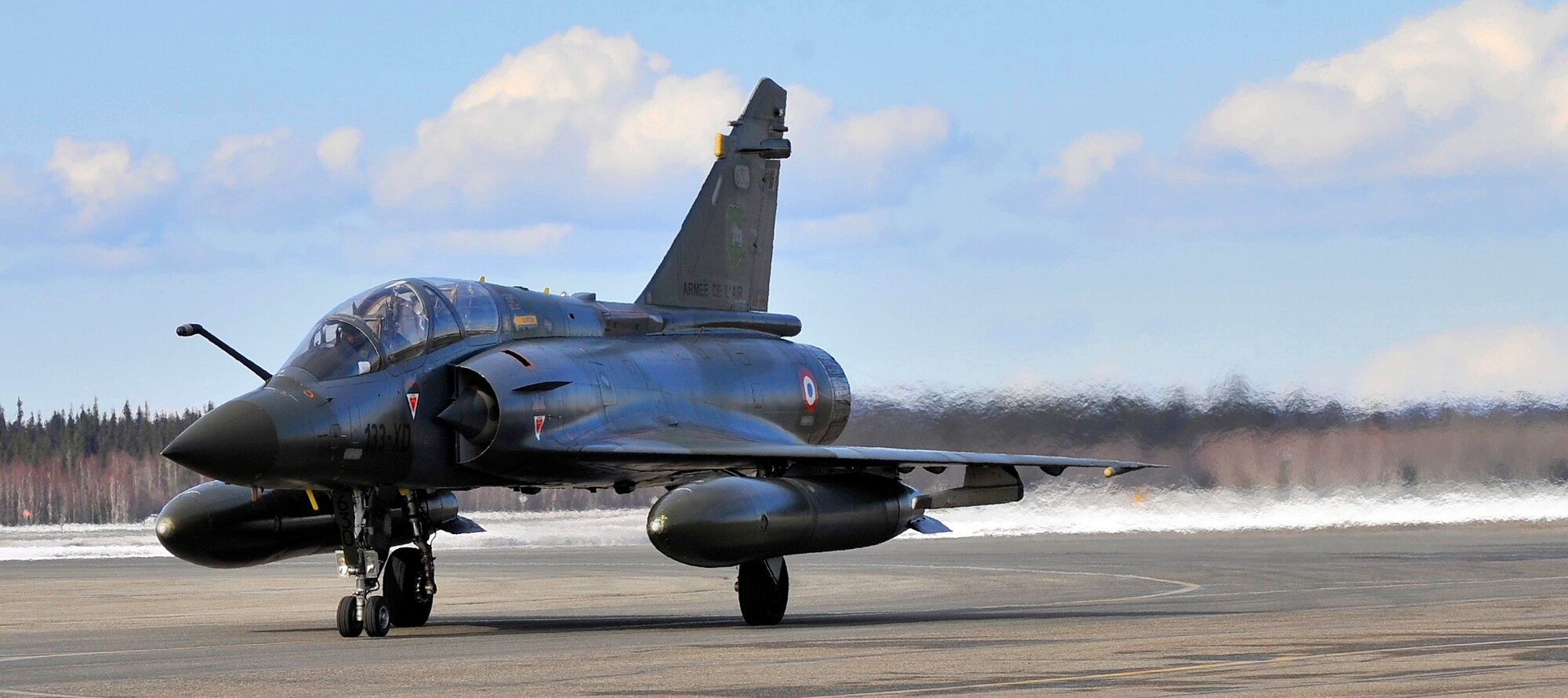 A Mirage 2000 Fighter from Luxeuil Air Base, France taxis into position April 14, 2009, Eielson Air Force Base, Alaska. Realistic combat training, such as that during a Red Flag-Alaska exercise, is vital to the success of air and space operations. (U.S. Air Force photo/Airman 1st Class Willard E. Grande II)