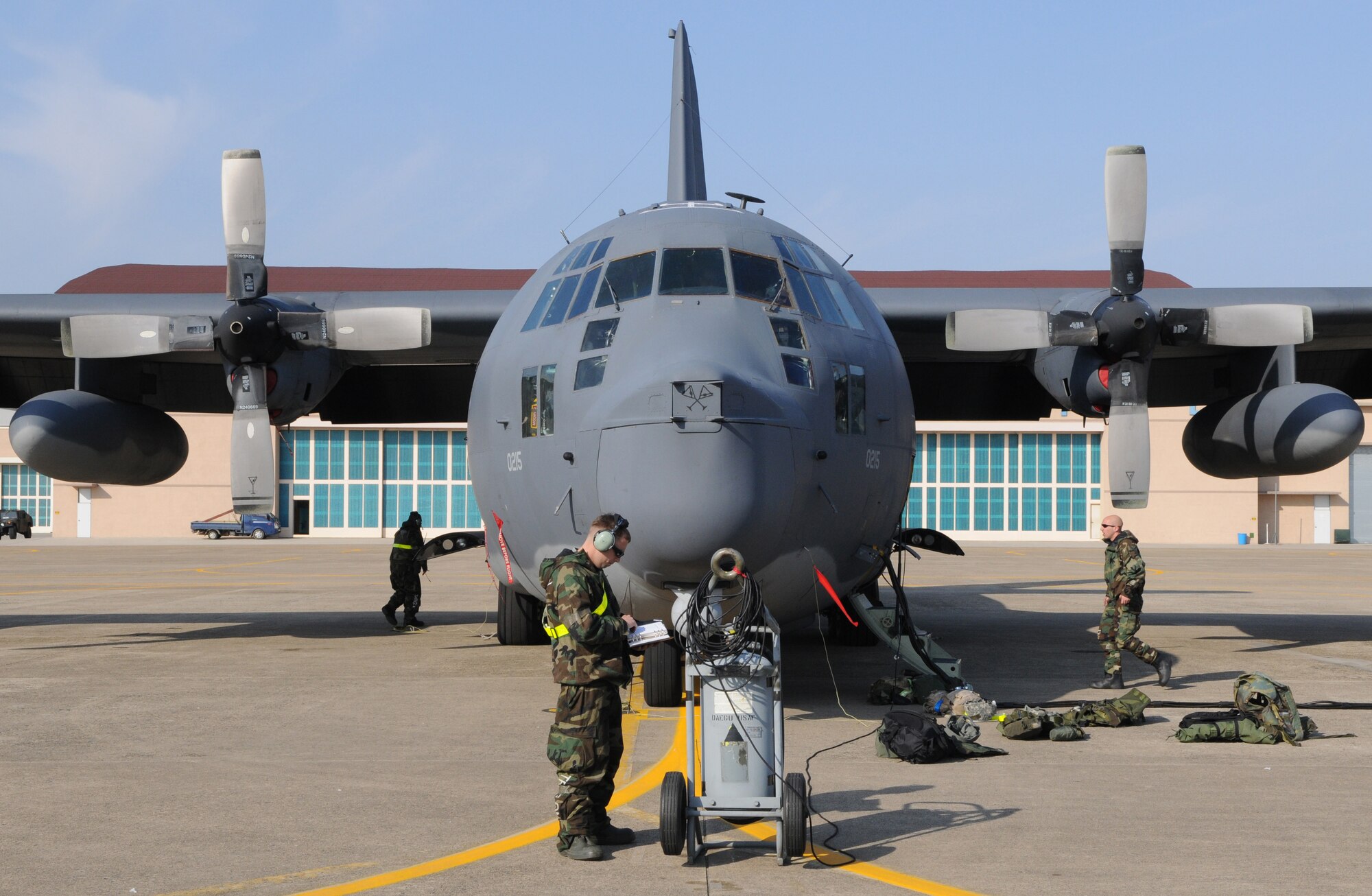 DAEGU AIR BASE, Republic of Korea -- Maintainers from the 353rd Maintenance Squadron prepare a 17th Special Operations Squadron MC-130P Combat Shadow to be defueled here March 24. More than 350 members of the 353rd Special Operations Group spent nearly a month at Daegu Air Base, Republic of Korea, testing and assessing their wartime skills necessary to survive and operate in any environment. (U.S. Air Force photo by Tech. Sgt. Aaron Cram)