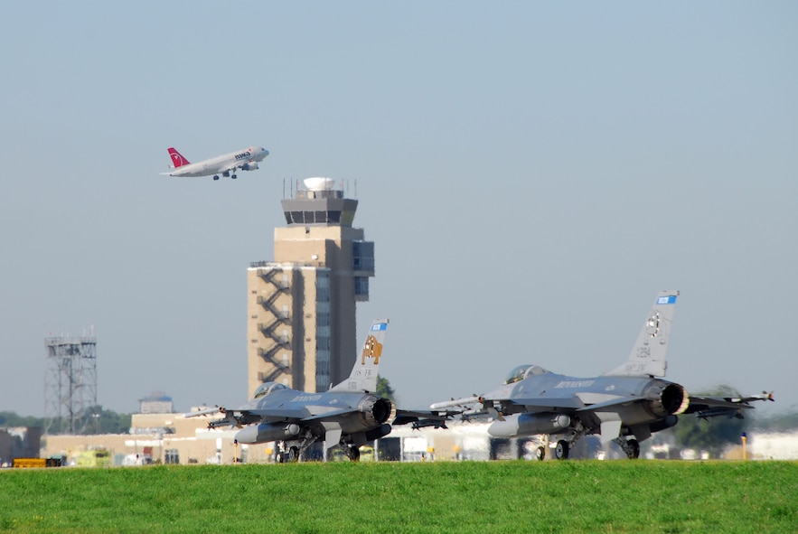 Two F-16C Fighting Falcons of the 148th Fighter Wing, Duluth, Minn. Air National Guard Base, taxi to the runway at the Minneapolis International Airport, Minn. Sept. 5, 2009.  The 148th performed Air Sovereignty Alert missions for the Republican National Convention from both Duluth and Minneapolis. (U.S. Air Force photo by Tech. Sgt. Jason W. Rolfe)