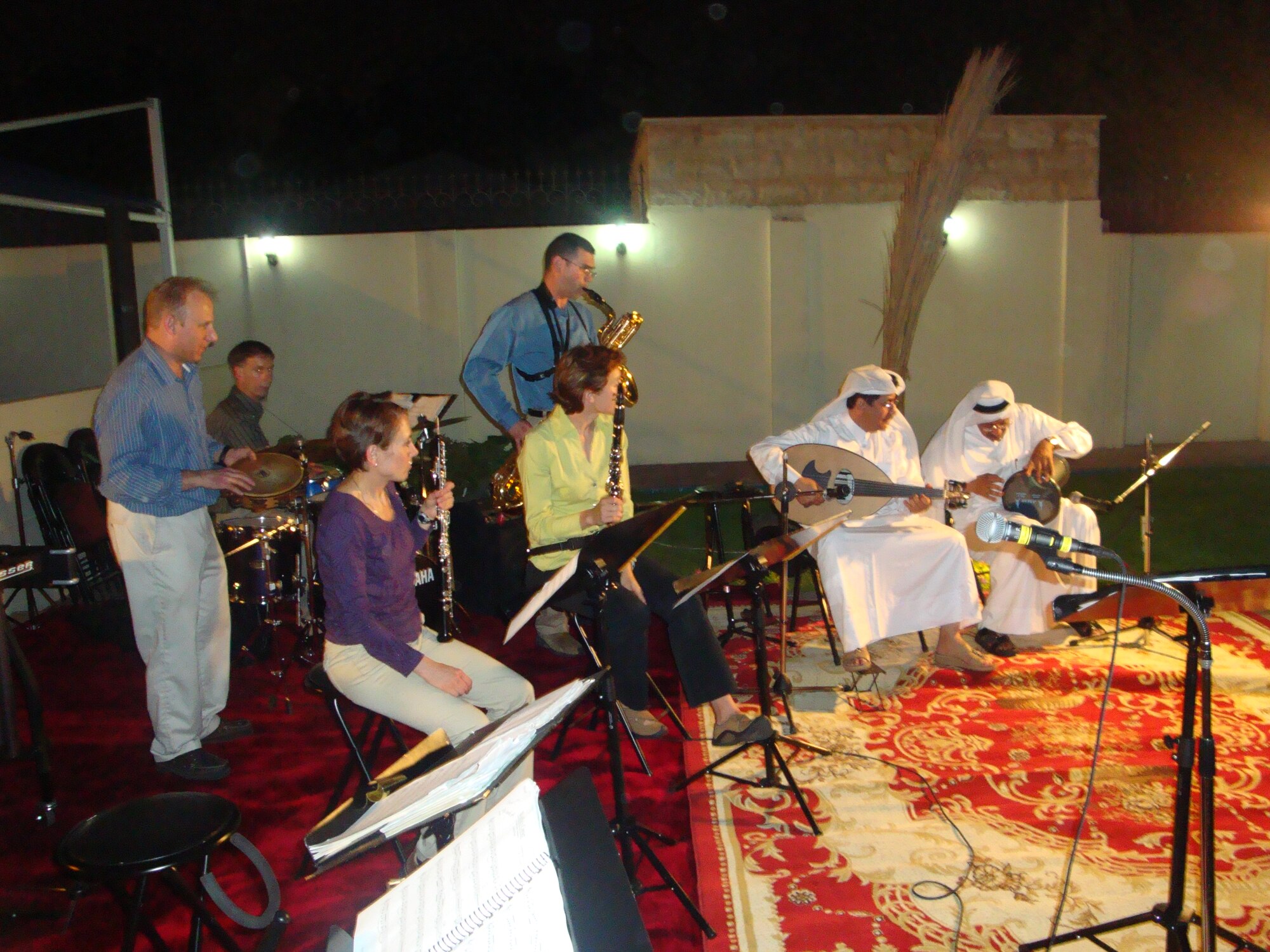 Members of Mirage perform with local percussionists Abdulaziz Jasem Mohd. Al-Haidos and Aleaq Sahid