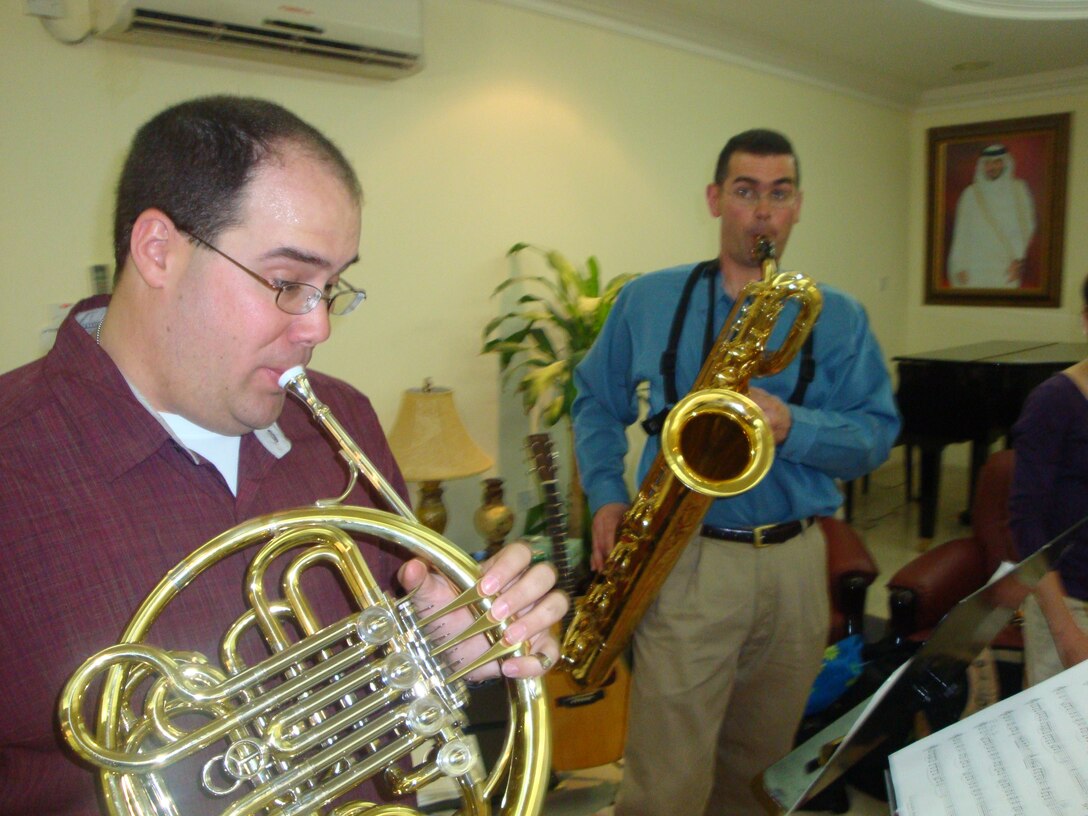 TSgts Ken Soper and Alex Vieira perform at the US Embassy Doha, Qatar