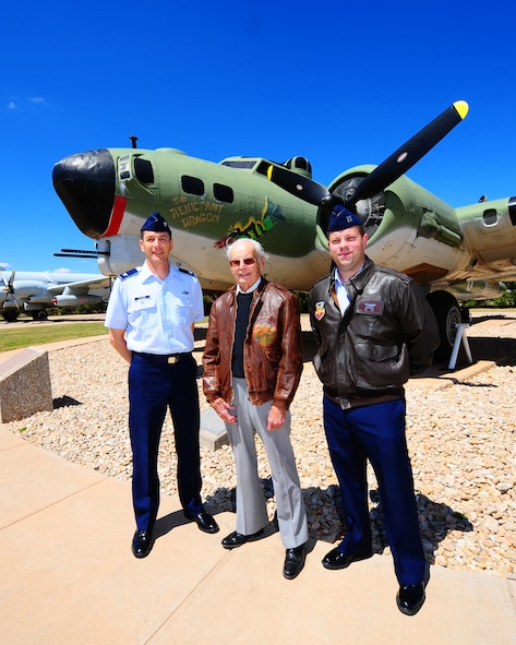 DYESS AIR FORCE BASE, Texas - From left to right Col. Gavin Ketchen, Paul Rehm, and Capt. Jeffrey Clesse share flying stories in front of the B-17 Flying Fortress in the Air Park here Monday, April 13.  Mr. Rehm was a B-17 navigator during World War II. He was a member of the first daylight bombing raid onto Germany.  (U.S. Air Force phot by SSgt Alan Garrison)
