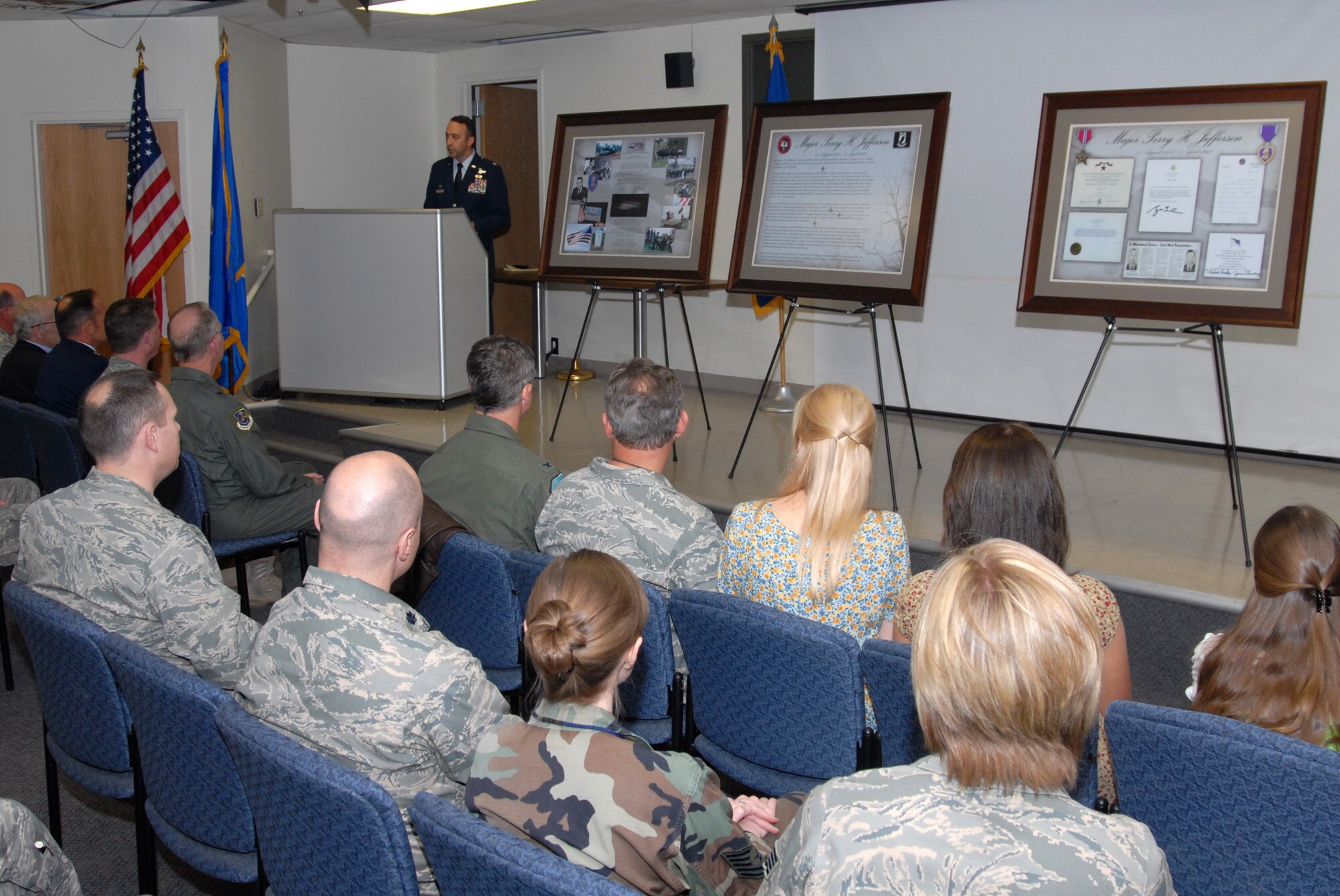 LtCol Timothy Conklin speaks to audience members during an auditorium dedication ceremony.  Audience members in attendance have come from as far away as Colorado and Washington DC to honor Major Jefferson.  This auditorium will be visited by nearly every Air Force and Air National Guard Intel airman as they enter thier training into their career field.