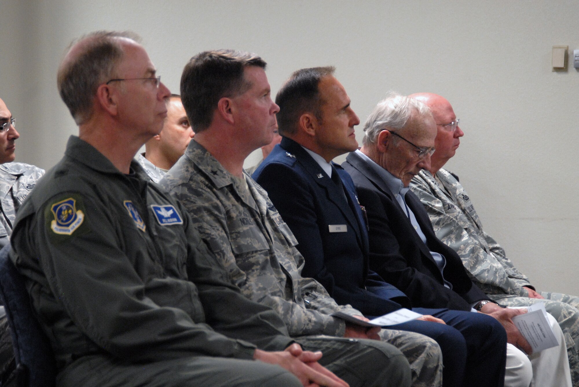 Military members and brother of Major Perry Jefferson, Mr. Mike  Jefferson, attend the Intel Auditorium dedication ceremony.