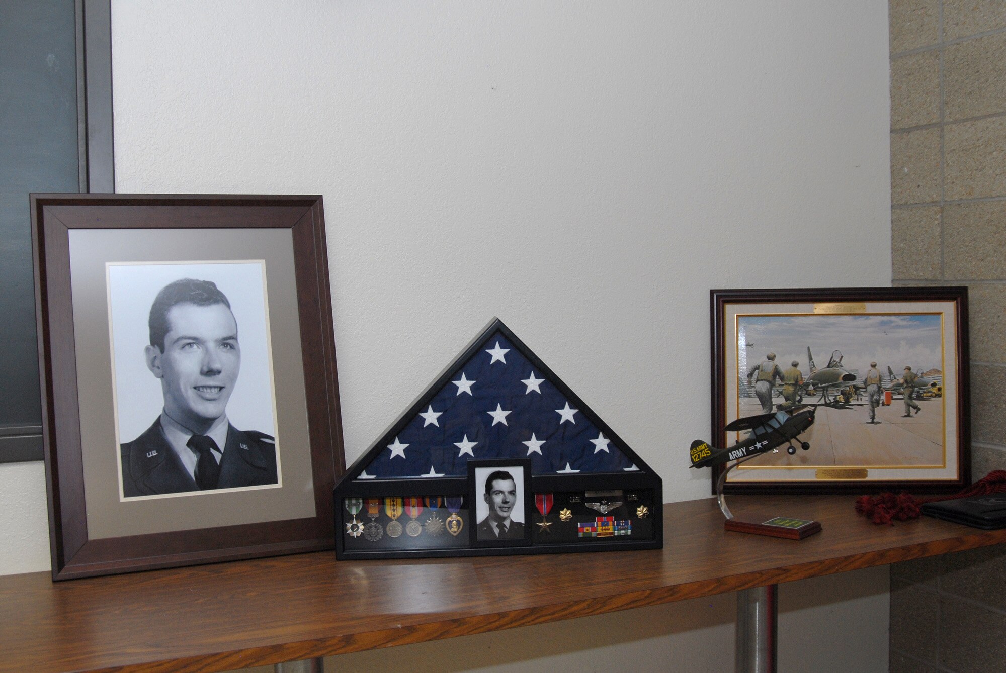 This photo depicts some of the momentos that were donated from the Colorado Air National Guard for the auditorium that will be named after Major Perry Jefferson.