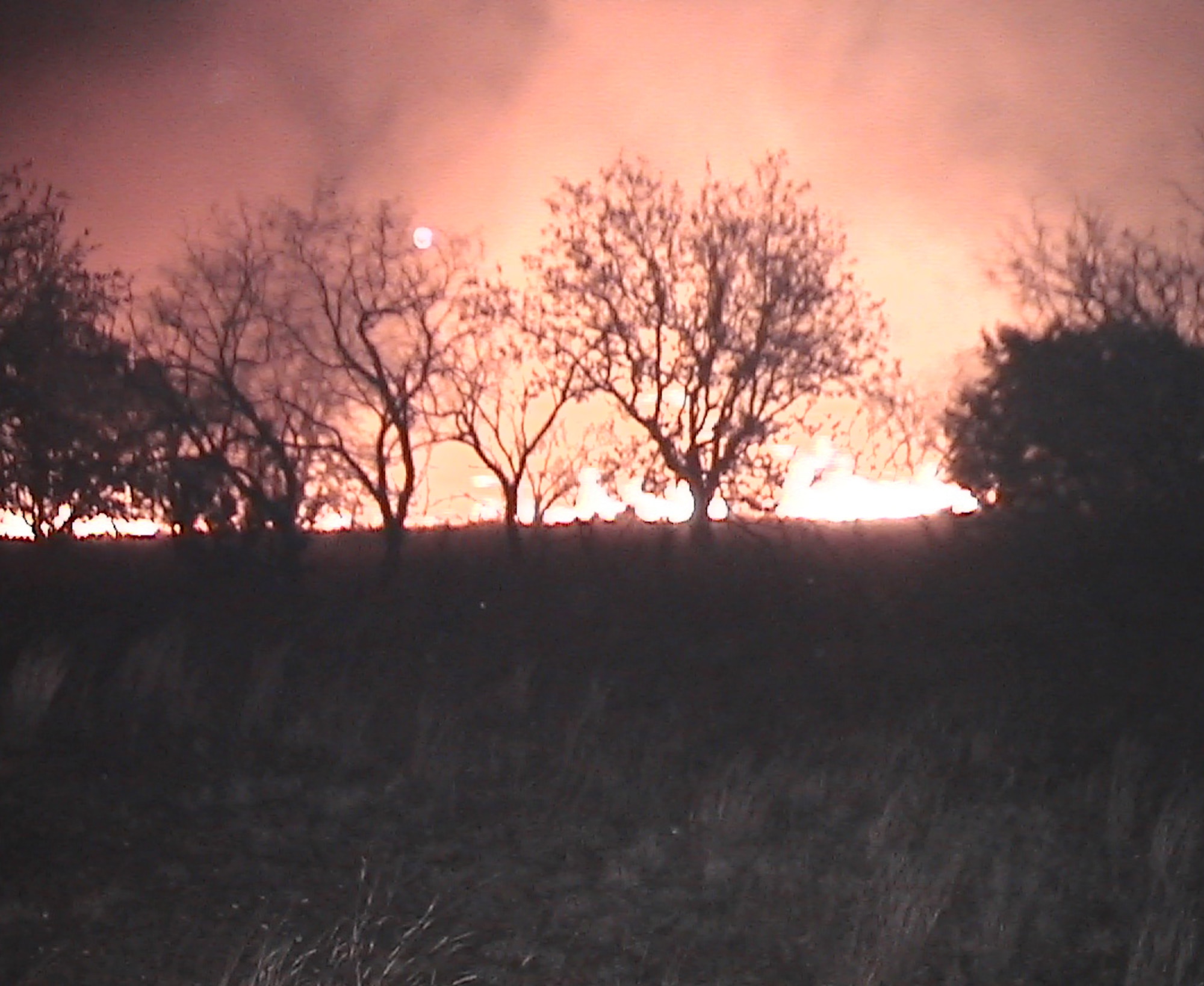 WEST TEXAS - Dyess fire crews responded to call for mutual aid in a near 18,000 acre wildland fire. Fourteen fire fighters helped protect structures in the southeast section of the fire and prevented four from being destroyed. (U.S. Air Force photo)                    