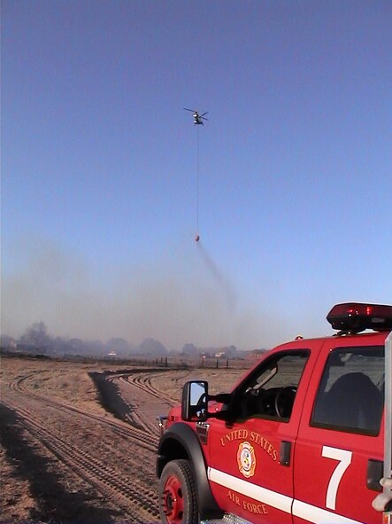 WEST TEXAS - Dyess fire crews responded to call for mutual aid in a near 18,000 acre wildland fire. Fourteen fire fighters helped protect structures in the southeast section of the fire and prevented four from being destroyed. (U.S. Air Force photo)                    
