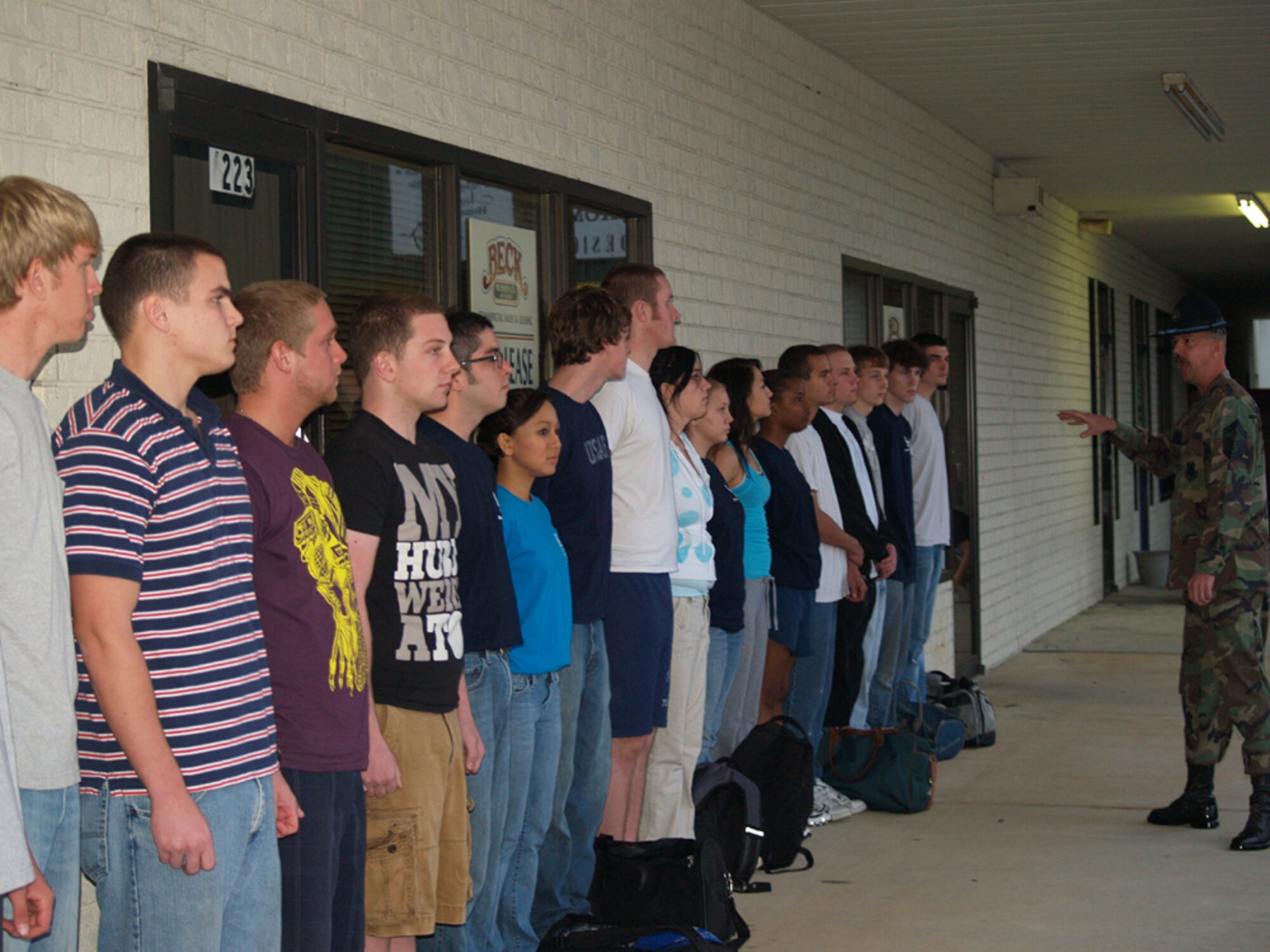 Senior Master Sgt. Grant Dugre barks commands at a recruit recently as part of a Basic Military Training orientation for members of the 331st Recruiting Squadron delayed entry program. The orientation is intended to mentally prepare the young men and women for what they can expect upon arrival at Lackland Air Force Base for BMT. Sergeant Dugre is the 96th Security Forces Squadron first sergeant at Eglin AFB, Fla. (Photo courtesy Jeni Senter/Santa Rosa Press Gazette)