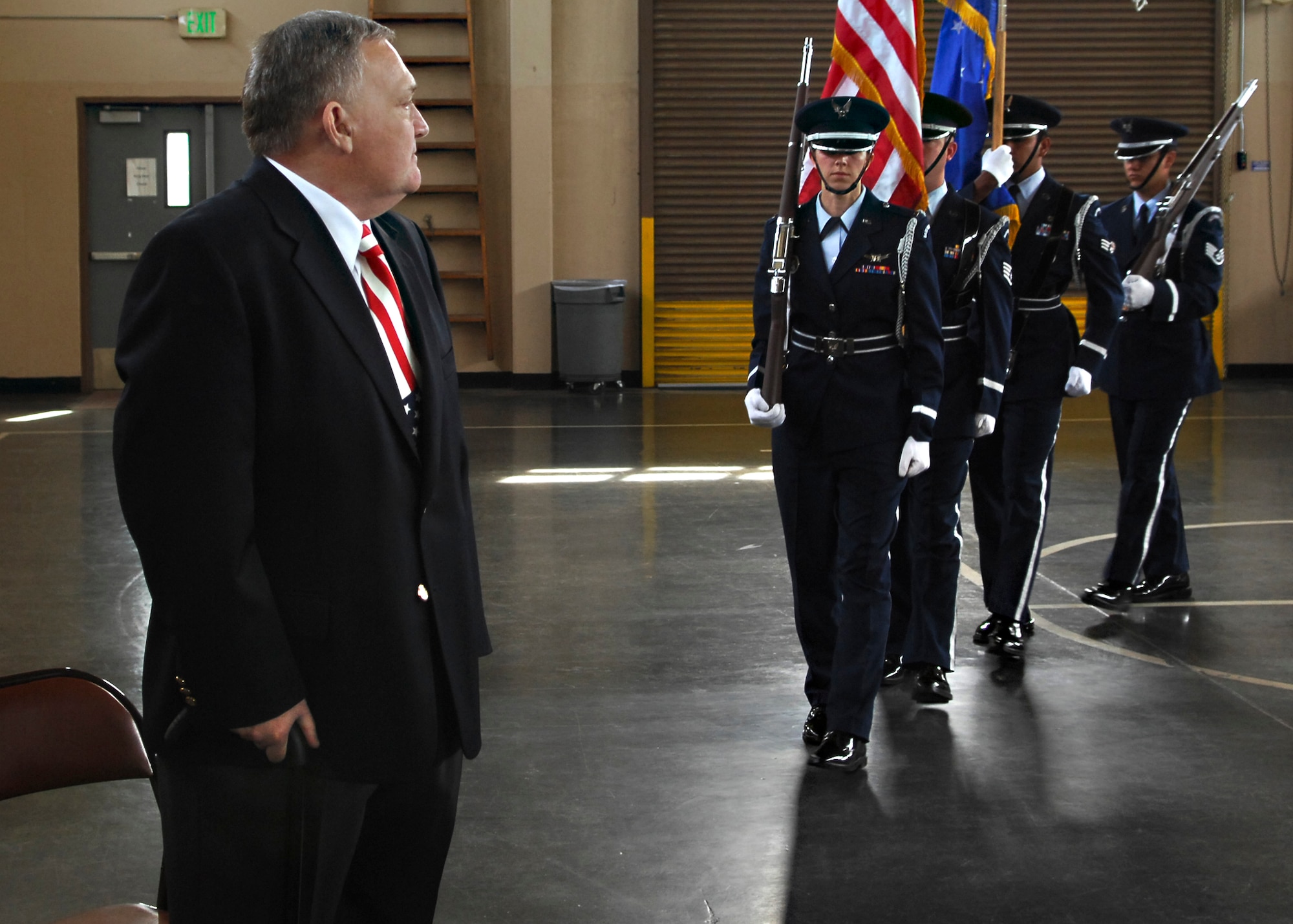 VISALIA, Calif. -- Vandenberg Air Force Base Honor Guard posts the colors during the presentation of a Purple Heart to Air Force veteran Michael McKinney. The honor guard and 30th Space Wing commander Col. David Buck traveled to Visalia, Calif., April 13 to present the medal.  Mr. McKinney earned the medal 41 years ago when he was injured by a mortar attack during the Vietnam War. (U.S. Air Force Photo/Airman 1st Class Heather R. Shaw)