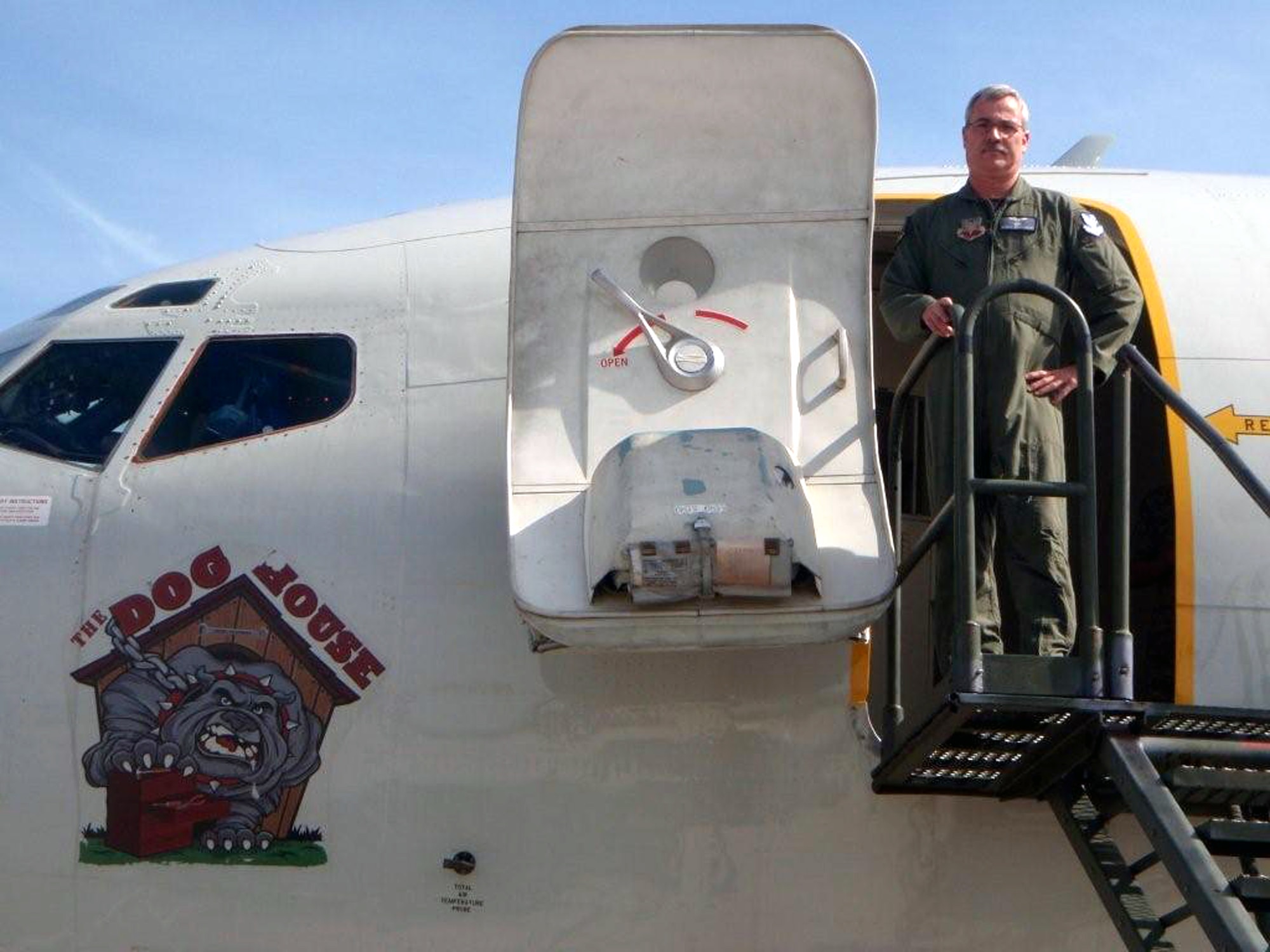 Chief Master Sgt. Randal Money, flight engineer for the E-8C Joint Surveillance Target Attack Radar System, or JSTARS, aircraft at the 128th Airborne Command and Control Squadron of the Georgia Air National Guard on Robins Air Force Base, Ga., stands next to his JSTARS plane prior to his final flight on April 9, 2009.  Chief Money's plane was refueled by his son, Staff Sgt. Kenneth Essick, a KC-10 boom operator from McGuire Air Force Base, N.J., during Chief Money's final flight.  (U.S. Air Force Photo)
