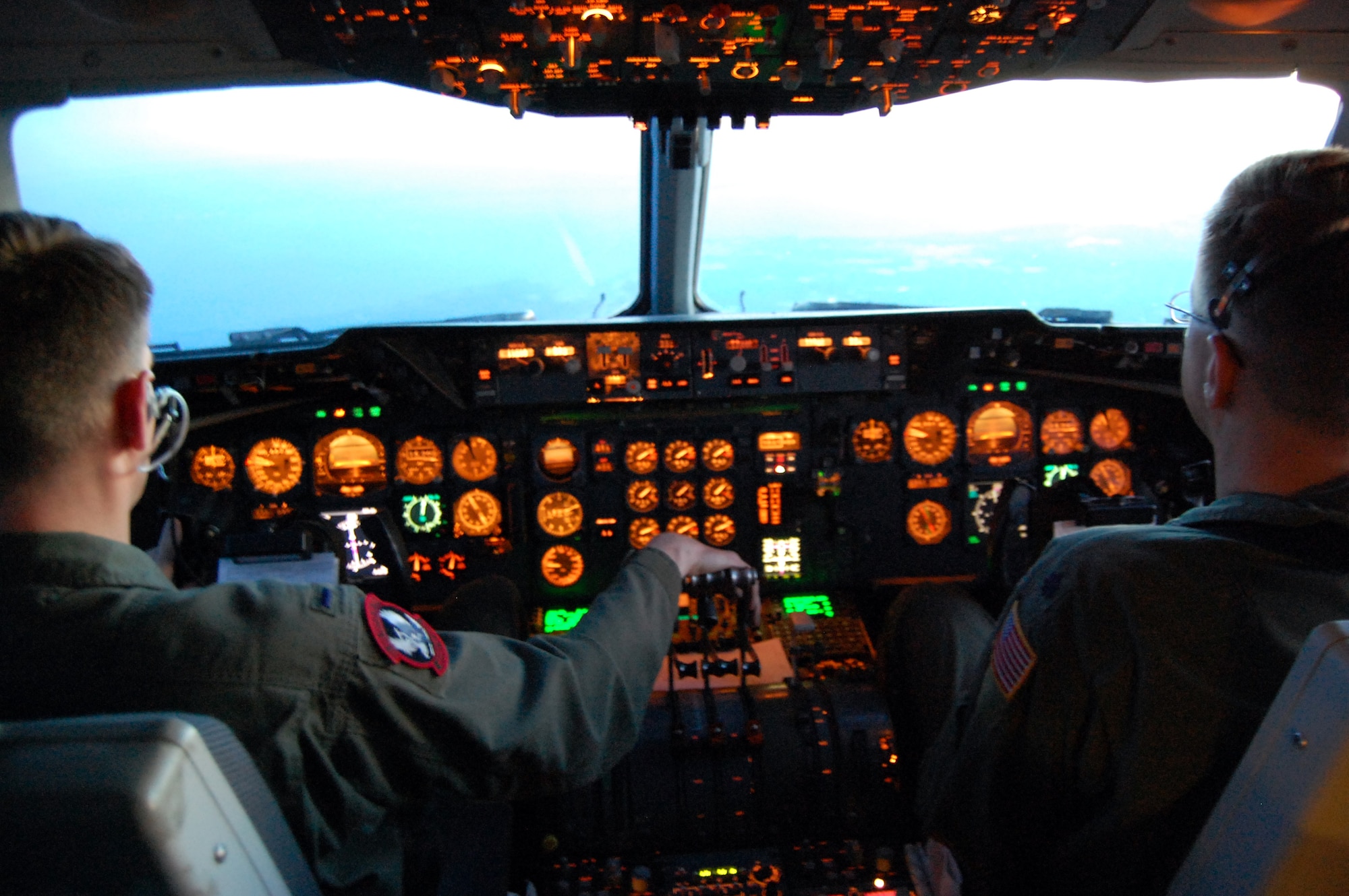 First Lt. Matthew Natale, and Lt. Col. Timothy MacGregor, both from the 2nd Air Refueling Squadron on McGuire Air Force Base, N.J., fly a KC-10 Extender on April 9, 2009, during air refueling mission. (U.S. Air Force Photo/Tech. Sgt. Scott T. Sturkol)