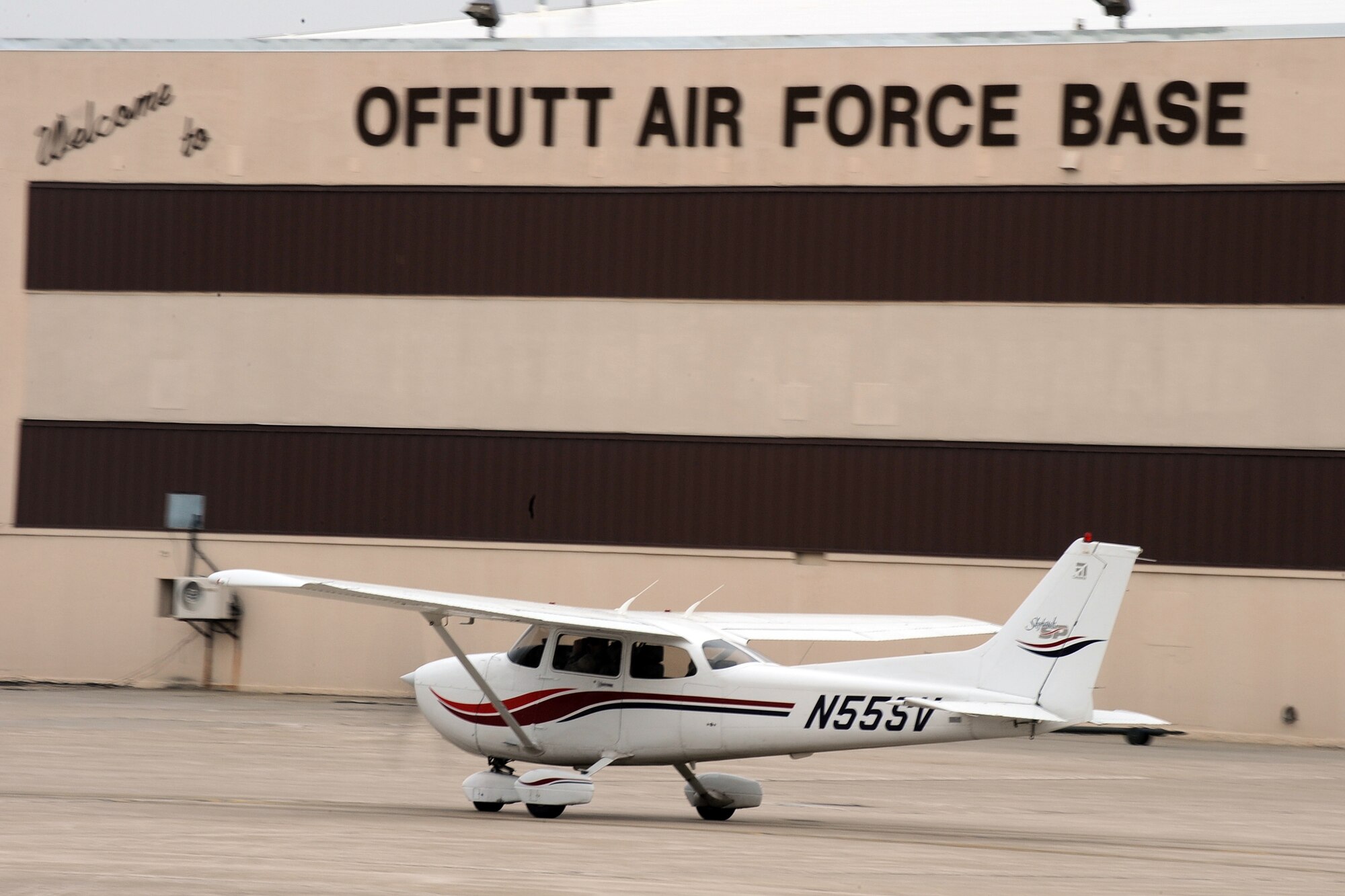 OFFUTT AIR FORCE BASE, Neb. -- A Cessna 172, one of four in the LeMay Aero Club's inventory, begins to taxi to the Offutt runway. Scott Voichoskie, the flight instructor inside stresses to his student the importance of every switch and control. Mr. Voichoskie has been teaching people how to fly at the aero club since 1991, and said he thinks everyone should learn to fly. For people who are interested in learning how to fly, the aero club offers introductory rides for a small fee. 