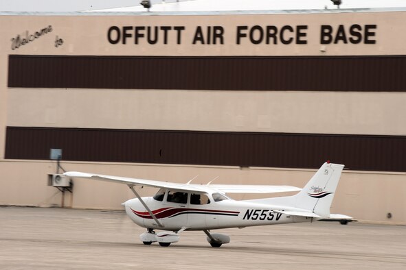 OFFUTT AIR FORCE BASE, Neb. -- A Cessna 172, one of four in the LeMay Aero Club's inventory, begins to taxi to the Offutt runway. Scott Voichoskie, the flight instructor inside stresses to his student the importance of every switch and control. Mr. Voichoskie has been teaching people how to fly at the aero club since 1991, and said he thinks everyone should learn to fly. For people who are interested in learning how to fly, the aero club offers introductory rides for a small fee. 
