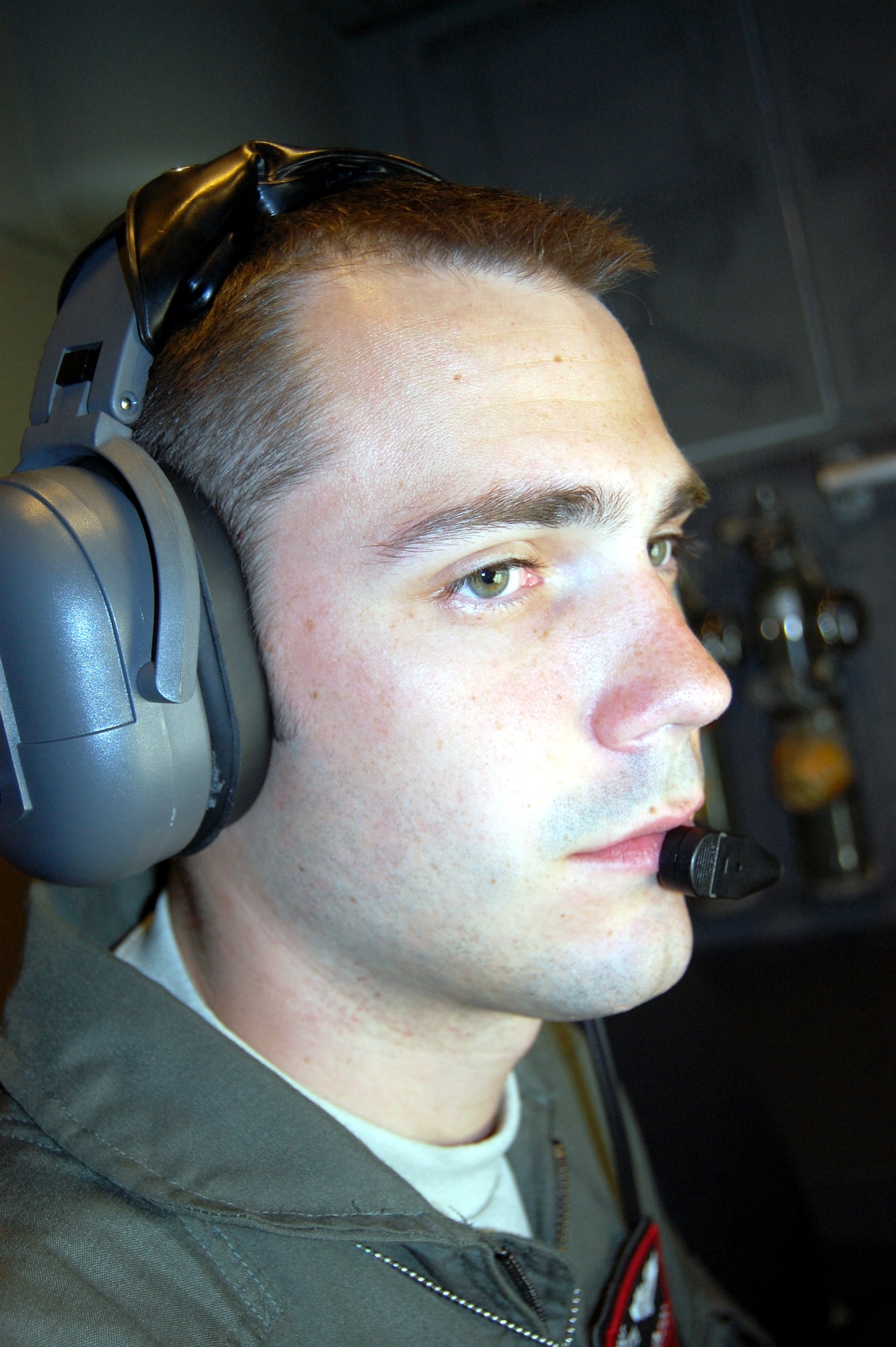 Staff Sgt. Kenneth Essick, boom operator for the 2nd Air Refueling Squadron on McGuire Air Force Base, N.J., goes through a pre-flight operations check in the boom pod of a KC-10 Extender on April 9, 2009, prior to an air refueling mission.  On that mission, Sergeant Essick refueled his father's E-8C Joint Surveillance Target Attack Radar System aircraft from the 116th Air Control Wing of Robins AFB, Ga.  His father, Chief Master Sgt. Randal Money, was on his final flight as a flight engineer for the E-8C.  (U.S. Air Force Photo/Tech. Sgt. Scott T. Sturkol)