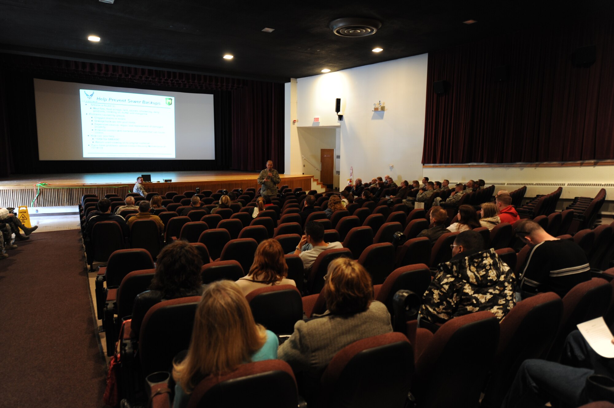 MINOT AIR FORCE BASE, N.D. – Col. Joel Westa, 5th Bomb Wing commander, speaks to members of the base community during the Town Hall meeting here April 9. The meeting served as a forum for sharing concerns and featured information on housing privatization, the new Army and Air Force Exchange Services, and other topics. (U.S. Air Force photo by Senior Airman Sharida Jackson)
