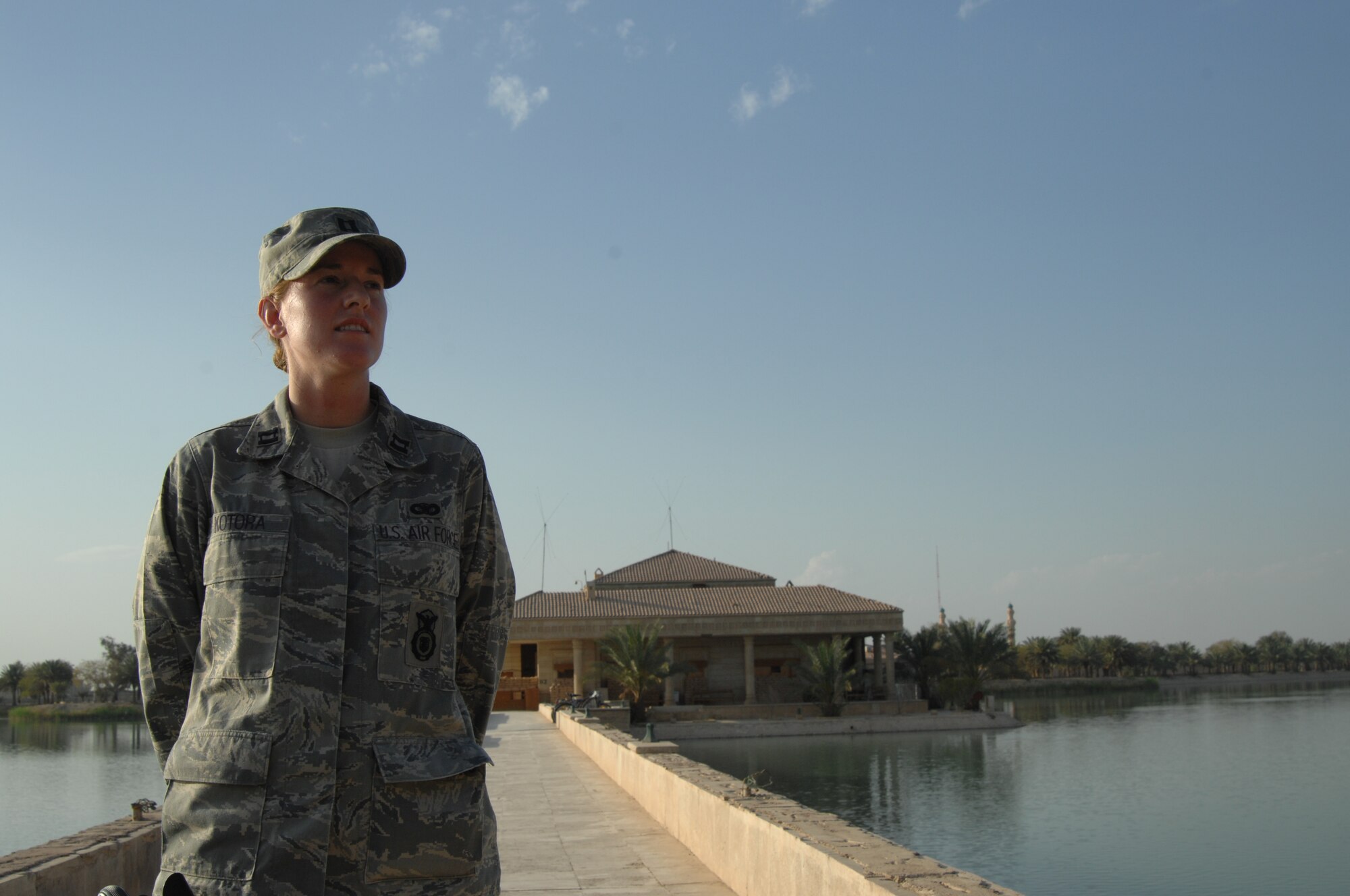 Capt. M. Kathryn Kotora, Joint Task Force 134 J3 Future Ops Air officer, is responsible for coordinating all air travel for Iraqi detainees at multiple detention facilities throughout Iraq. During her tenure here, the Auburn, Wash., native has planned, scheduled and coordinated more than 250 air missions to include 48 detainee flights and has transferred more than 17,000 detainees. Captain Kotora is deployed from Andrews Air Force Base, Md. (U.S. Air Force photo by Staff Sgt. Tim Beckham)
