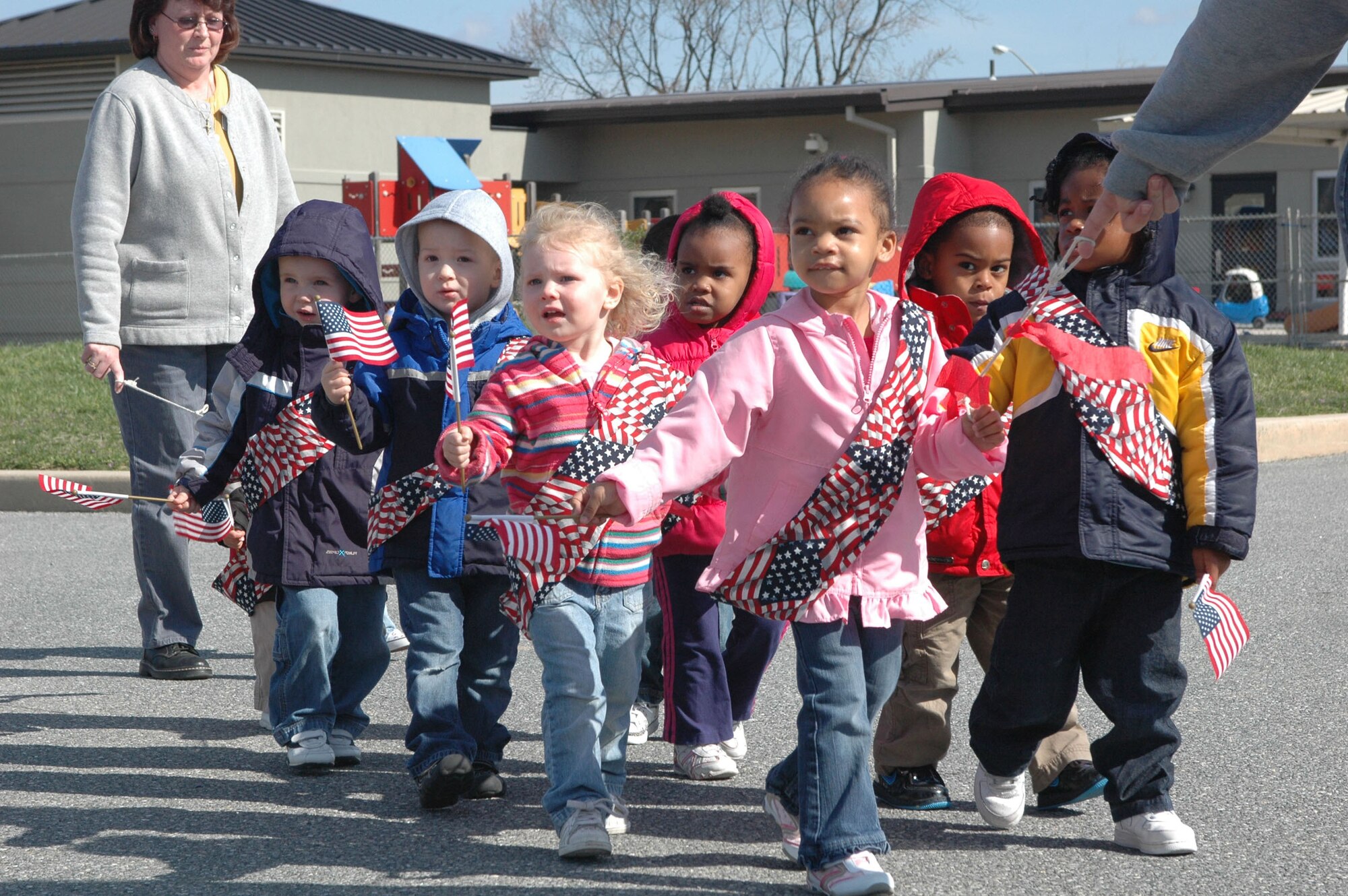 In honor of Month of the Military Child, children from the Dover Air Force Base Child Development Center participated in a patriotic-themed parade April 8. This annual tradition takes place on CDC grounds and was attended by numerous family members. (U.S. Air Force photo/ Master Sgt. Veronica Aceveda)