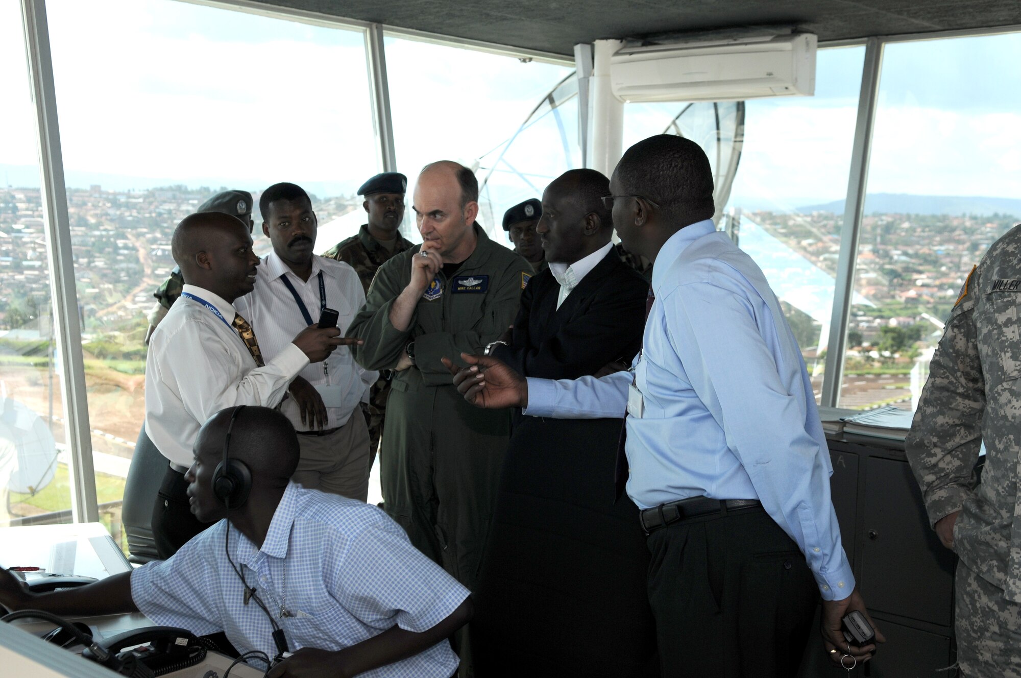 17th Air Force Vice Commander Brig. Gen. Mike Callan listens to input from members of Rwanda's Civil Aviation Administration as they assess the state of air traffic control capability in the country at the Kigal International Airport control tower March 25. (USAF Photo by Master Sgt. Jim Fisher)