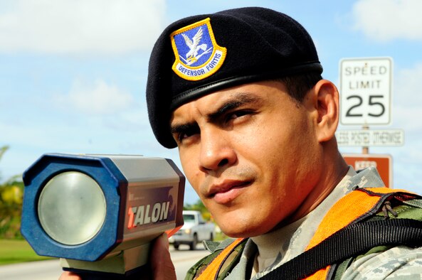 ANDERSEN AIR FORCE BASE, Guam - Staff Sgt. Shaun Morrison, 254th Security Forces Active Guardsman, tracks the speed of incoming vehicles to the base here April 15 as part of his patrolman duties. Sgt. Morrison was recently named Pacific Forces Airman of the Year for Air National Guard. (U.S. Air Force photo by Airman 1st Class Courtney Witt)