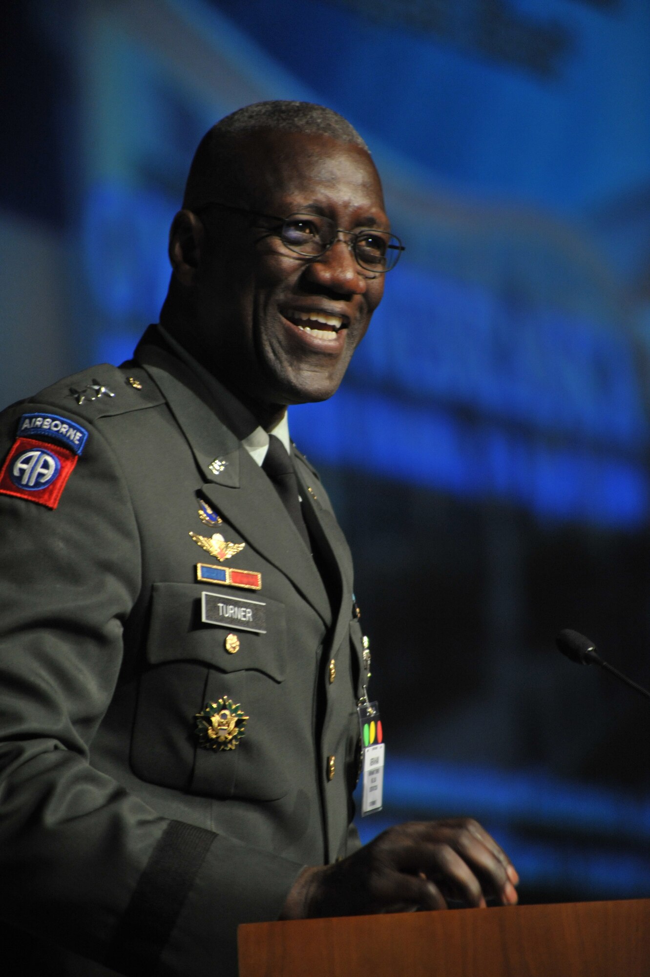 U.S. Strategic Command Chief of Staff Maj. Gen. Abraham Turner, addresses the crowd at the 2009 Cyberspace Symposium at the Qwest Center in Omaha, Neb. April 7-8. The theme for the symposium was "Advancing Cyberspace Capabilities to Deliver Integrated Effects."  Symposium sessions included perspectives from senior Department of Defense, U.S. and Allied government, industry, and academia speakers. US Air Force photo by Daniel J. Rohan Jr.