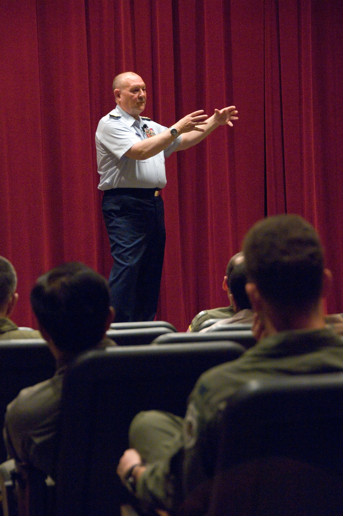 Adm. Thad Allen, commandant of the U.S. Coast Guard, addresses Air War
College students April 9 about Homeland Security. The admiral's speech,
which also touched on some of the ways the Coast Guard and Air Force work
together, was part of the Distinguished Lecture Series that Air War College
provides its students in order to educate them on leadership. Under the
program, leaders from across a wide range of disciplines, including
diplomats and scholars, speak on a regular basis to Air War College classes. (U.S. Air Force photo by Melanie Rodgers Cox)