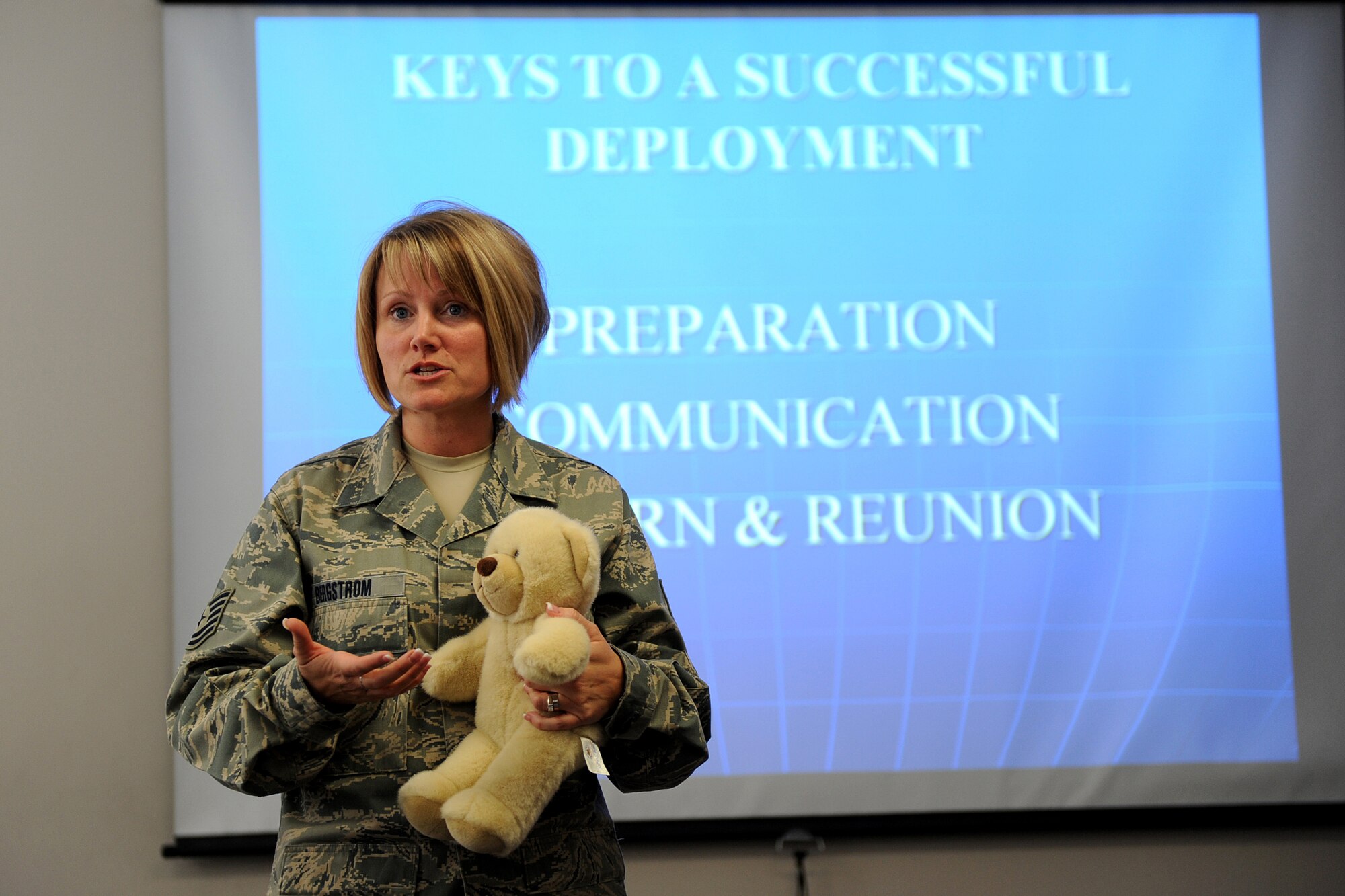 OFFUTT AIR FORCE BASE, Neb. - Tech Sgt. Stephanie R. Bergstrom, readiness non commissioned officer in charge for the 55th Force Support Squadron, speaks to Airmen during a pre-deployment briefing at the Airman and Family Readiness Center here April 8. The briefing provides Airmen with vital information they need prior to deploying such as maintaining communication throughout the deployment process, deployment benefits, wills and much more. 
U.S. Air Force Photo by Josh Plueger
