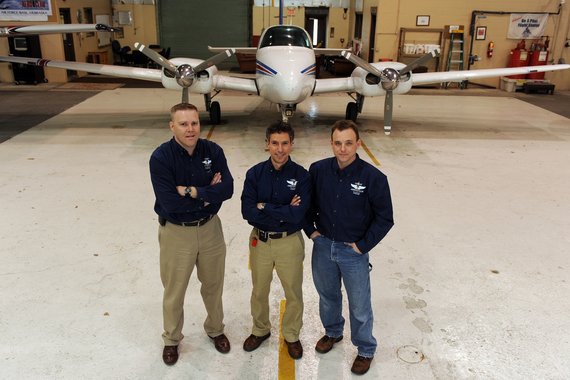 OFFUTT AIR FORCE BASE, Neb. ? From left to right Scott Voichoskie, Ernie DeSimone and Mike Nelson, all flight instructors at the LeMay Aero Club, stand in front of a BE-55 Baron. The instructors said they enjoy teaching people how to fly, and would encourage the Offutt community to take advantage of the aero club?s services.  U.S. Air Force Photo by Josh Plueger