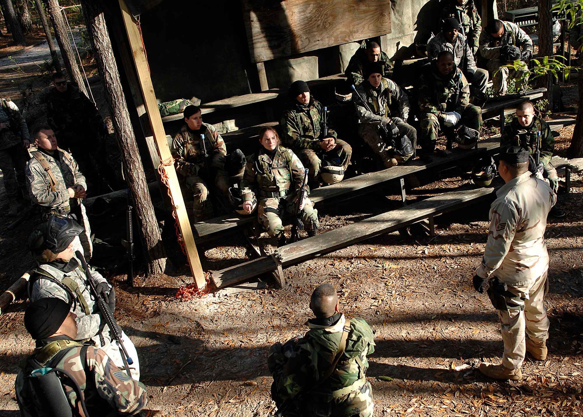 Staff Sgt. Fernando Olivas speaks to Team Charleston deployers about combat during Expeditionary Combat Skills Training on Charleston AFB April 8. ECST is required for Airmen who are deploying to hostile areas where combat knowledge and skills are required. ECST began on Charleston AFB in September of 2005. Sergeant Olivas is with the 437th Security Forces Squadron. (U.S. Air Force photo/Senior Airman Katie Gieratz)
