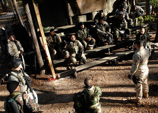 Staff Sgt. Fernando Olivas speaks to Team Charleston deployers about combat during Expeditionary Combat Skills Training on Charleston AFB April 8. ECST is required for Airmen who are deploying to hostile areas where combat knowledge and skills are required. ECST began on Charleston AFB in September of 2005. Sergeant Olivas is with the 437th Security Forces Squadron. (U.S. Air Force photo/Senior Airman Katie Gieratz)