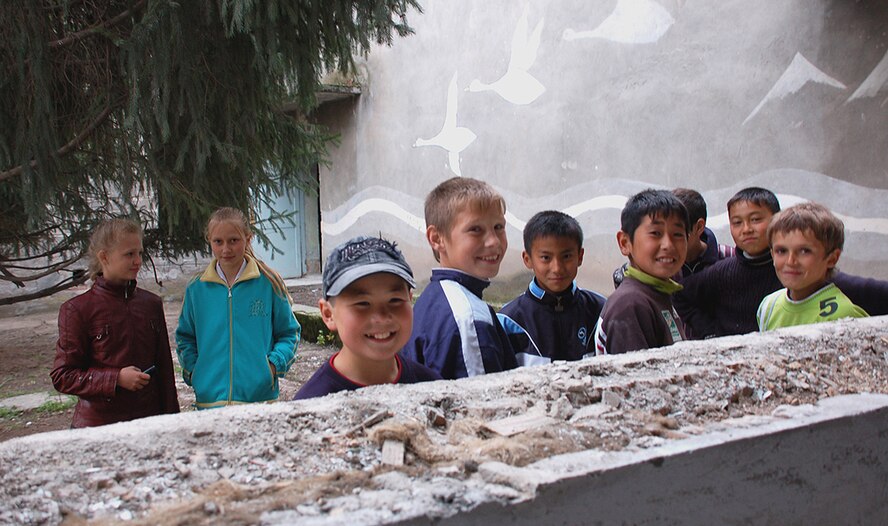 Children of the Birdik Village School in Kyrgyzstan are all smiles after a ground breaking ceremony for a $470,000 project to repair the school. The project is a joint effort between the U.S. State Department, U.S. Central Command, Manas Air Base and Birdik Village, and is scheduled to completed in Autumn 2009. When finished, the newly renovated school will house 200 students. (U.S. Air Force photo/Tech. Sgt. Phyllis Hanson)