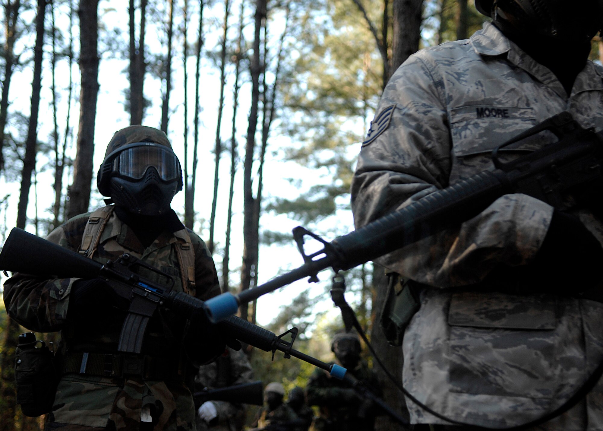 Charleston Airmen patrol the perimeter of the Expeditionary Combat Skills Training area on Charleston AFB April 8. ECST is required for Airmen who are deploying to hostile areas where combat knowledge and skills are required. This training occurs biweekly. (U.S. Air Force photo/Senior Airman Katie Gieratz)
