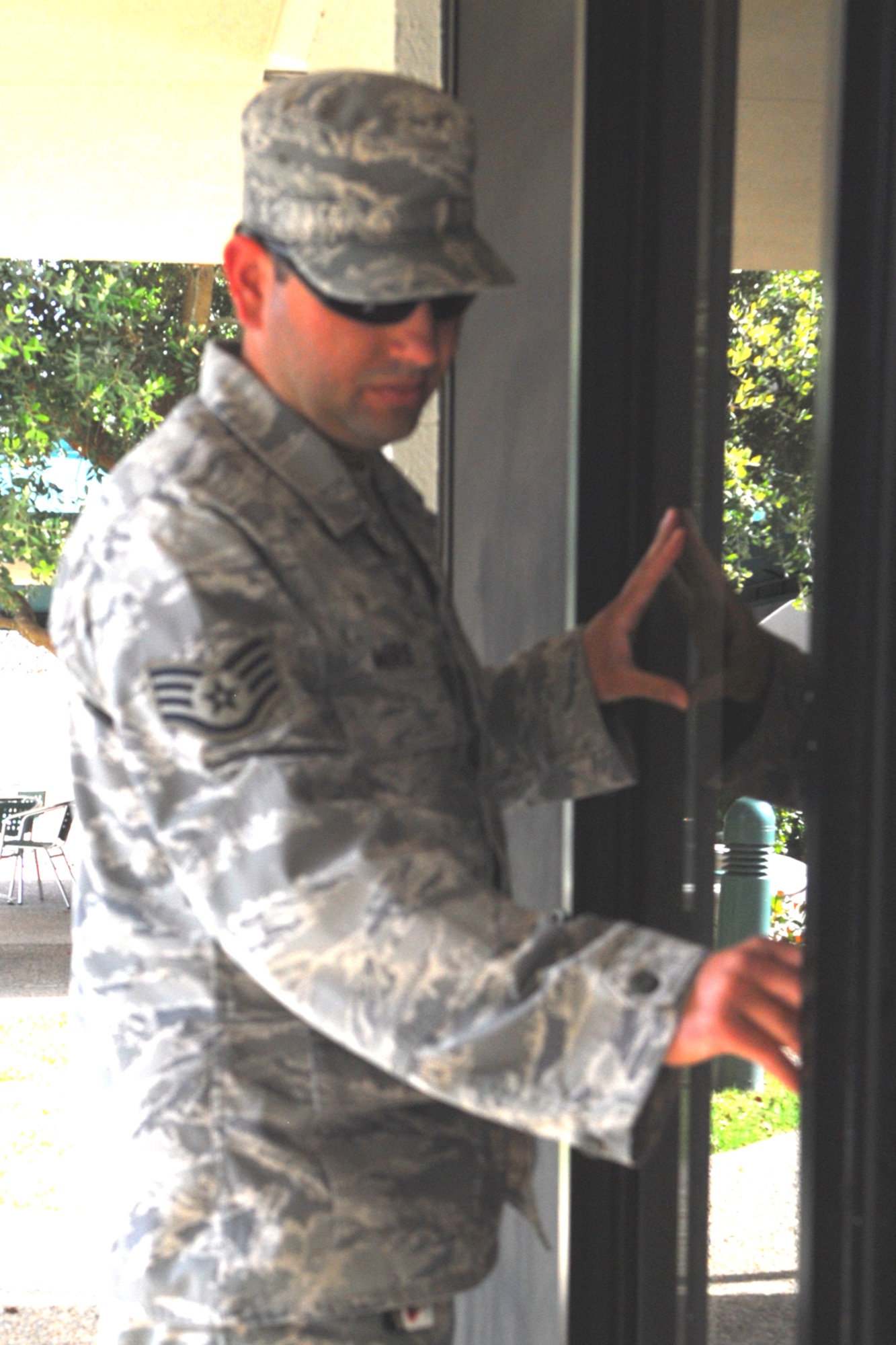 VANDENBERG AIR FORCE BASE, Calif. – Staff Sgt. Joshua Morse, a 30th Civil Engineer Squadron dormitory manager, checks the locks at the Airmen’s dormitories here to prevent property crime. It is mandatory for all Airmen living in the dormitories to lock up and secure their belongings every time they leave the dormitory. (U.S. Air Force photo/Airman 1st Class Steve Bauer)