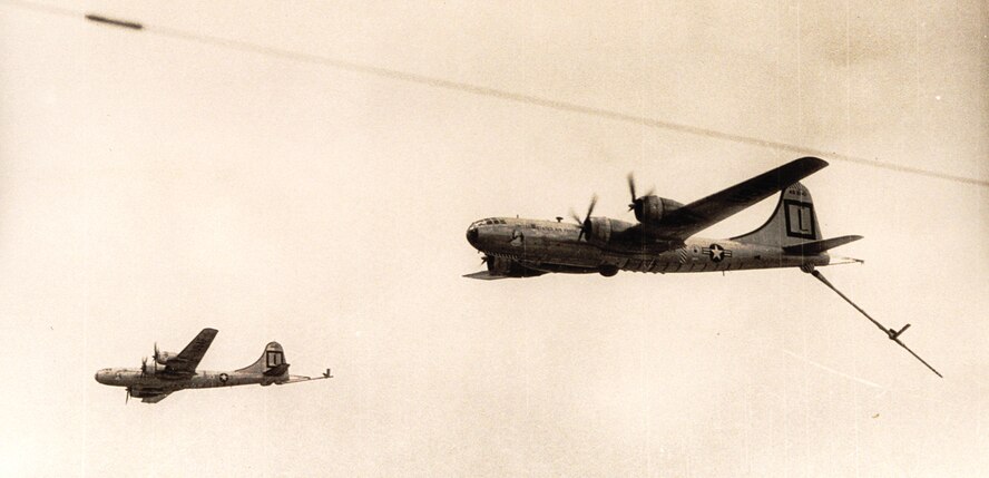 Three 91st Air Refueling Squadron KB-29Ps prepare to refuel the F-84Gs of the 31st Fighter Escort Wing during Operation Fox Peter One. (U.S. Air Force historical photo)