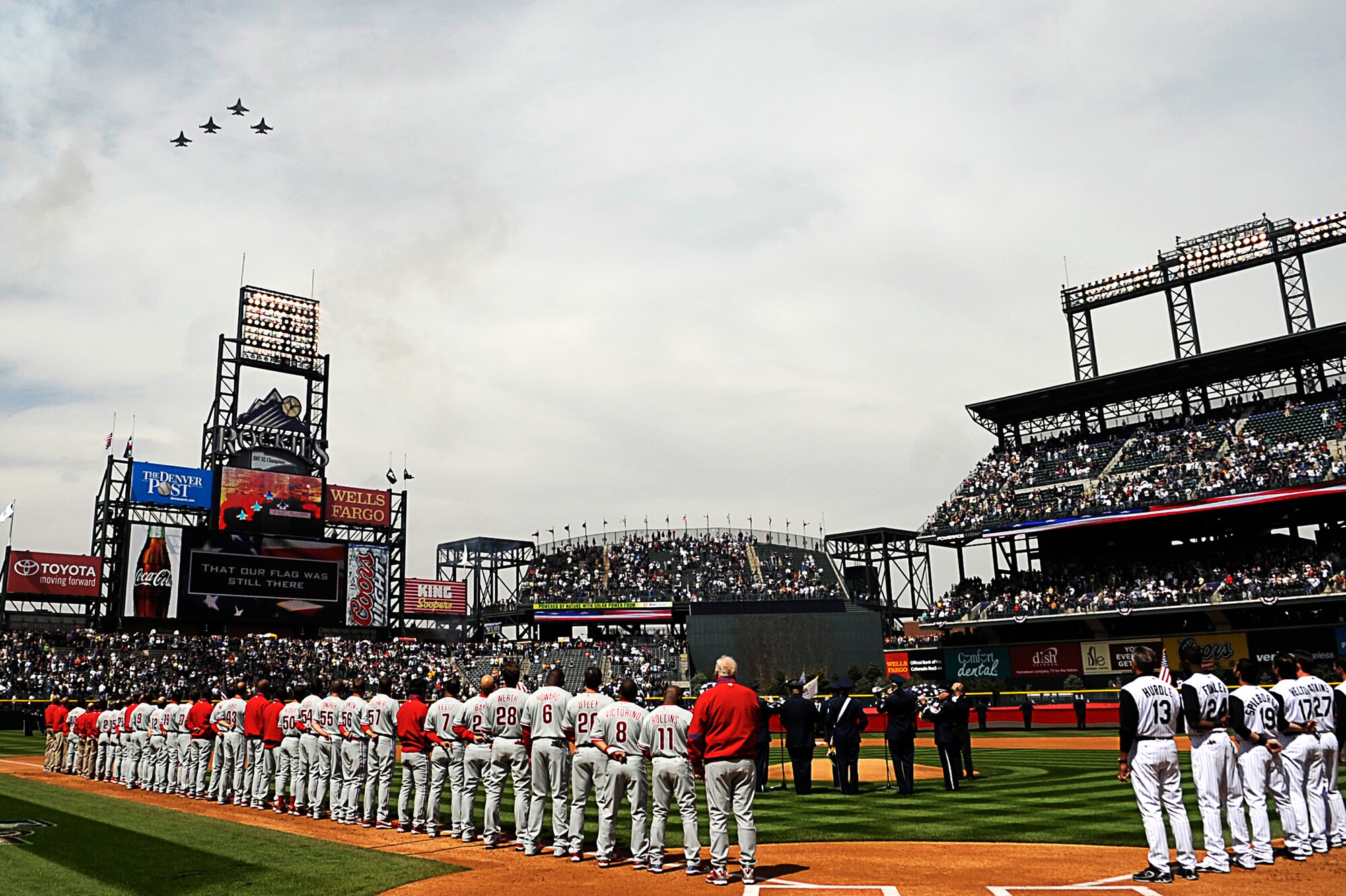DENVER, Colo. -- Members of the U.S. military participate in the Colorado Rockies Opening Day events here, April 10. More than 100 Soldiers, Sailors, Marines, Airmen and Coast Guardsmen took part in the opening ceremony. (U.S. Air Force photo by Tech. Sgt. Jeromy Cross) 
