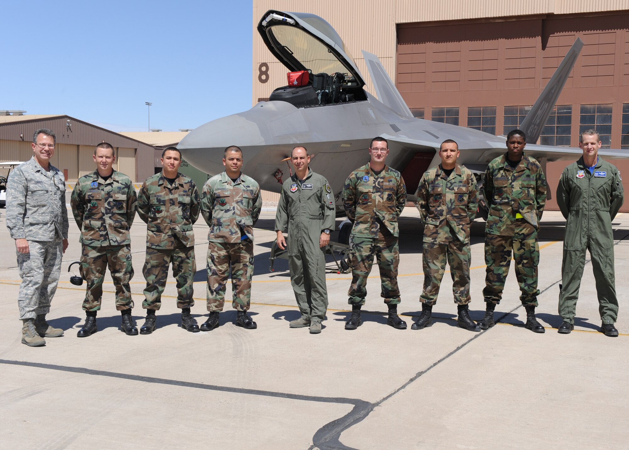The teams that compete in the 49th Maintenance Group Quarterly Load Crew competition pose for a photo with members of the 49th Fighter Wing leadership, April 10, at Holloman Air Force Base, N.M.  (U.S. Air Force photo/Senior Airman Michael Means)
