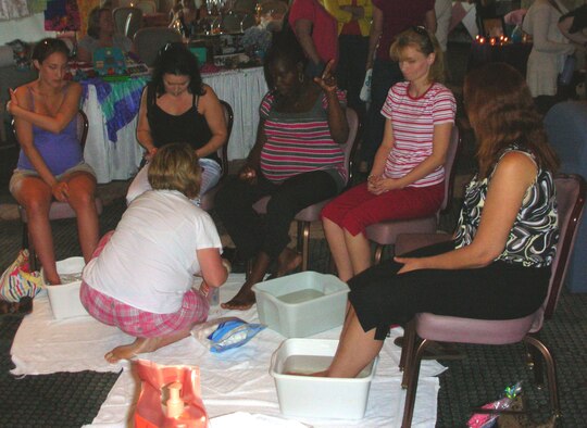 Spouses of deployed Tyndall members receive pedicures courtesy of the Tyndall Airman and Family Readiness Center's "Hearts Apart Spa Night." The event was meant to show appreciation for military spouses and families whose loved ones are currently deployed. Among the activities of the night, spouses who participated were able to receive manicures, make-overs, pedicures, waxing and other beautification/relaxation activites. All services were donated free-of-charge by businesses from the area to the more than 50 spouses present. (U.S. Air Force photo/SSgt Joshua Stevens)