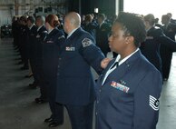 Members of the 919th Logistics Readiness Squadron, conduct an open ranks inspection during the April unit training assembly at Duke Field. The 919th LRS conducted the inspection to ensure personnel meet standards of dress and appearance.  The event also afforded an opportunity to practice formation movements and commands. (U.S. Air Force photo/Senior Airman Jon McCallum)