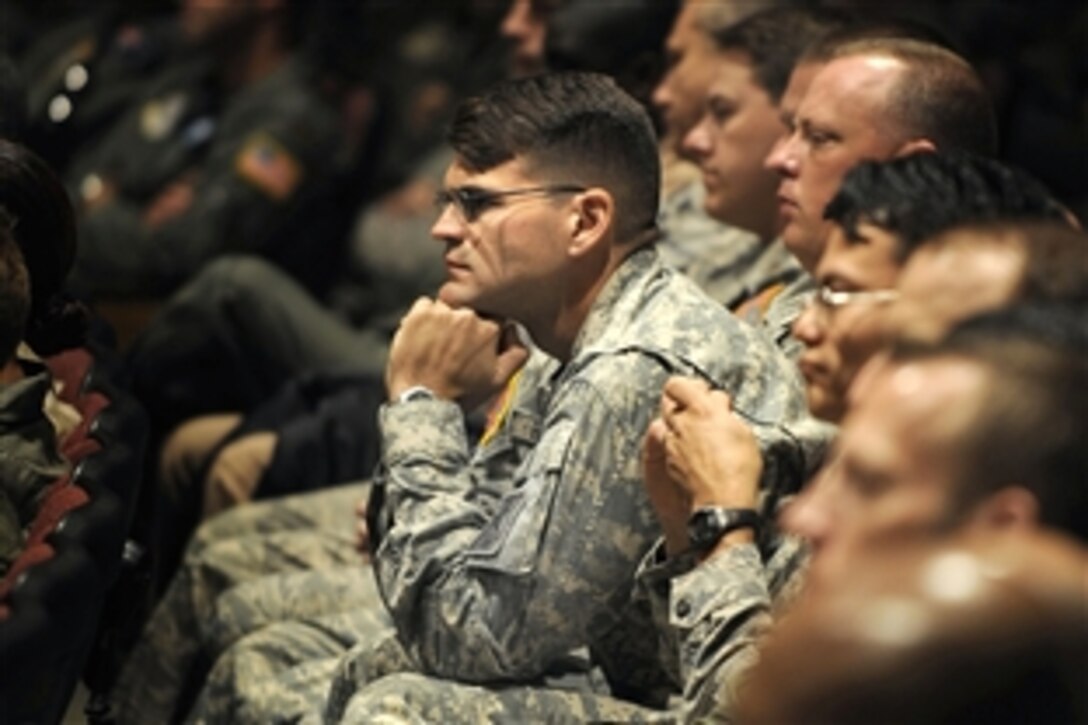 Students of the U.S. Air Force Air War College on Maxwell Air Force Base, Ala., listen to Defense Secretary Robert M. Gates as he gives his remarks while visiting there, April 15, 2009. 