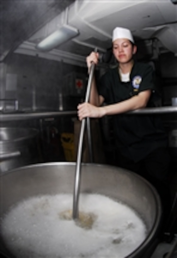 U.S. Navy Petty Officer 3rd Class Tracy Lewis prepares macaroni for the evening meal aboard the aircraft carrier USS John C. Stennis (CVN 74) underway in the Pacific Ocean on April 13, 2009.  The ship is on a six-month deployment in the western Pacific Ocean.  