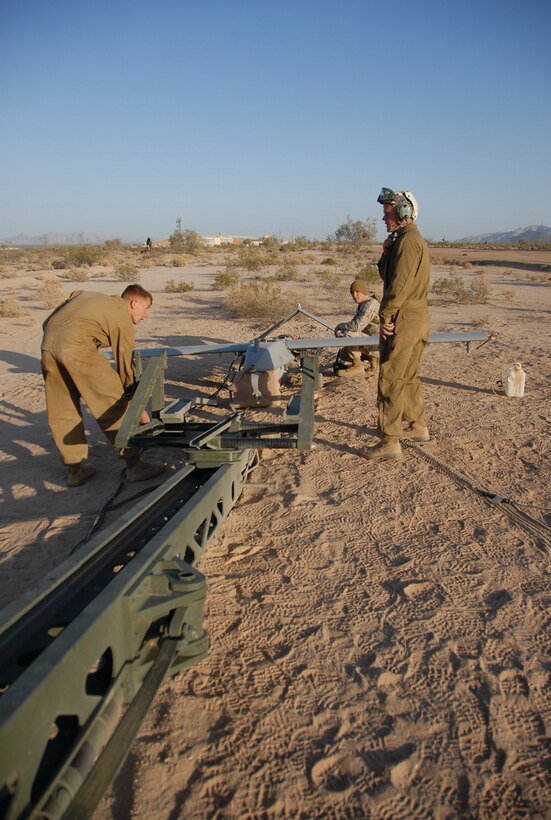 Marines with Marine Unmanned Aerial Vehicle Squadron 3 make final preparations on the Barry M. Goldwater to launch the UAV April 15. VMU-3 arrived in Yuma March 23 during the Weapons and Tactics Instructor course. VMU-3 was formed Sept. 12, 2008.