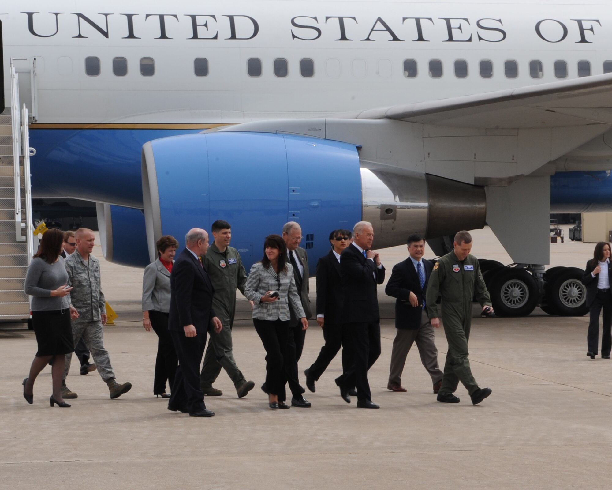WHITEMAN AIR FORCE BASE, Mo. - Vice President Joe Biden walks from Air Force Two escorted by Col. Robert Wheeler, 509th Bomb Wing commander, and Col. John Robinson, 509th BW vice commander, toward hanger T-9 April 16 where a rally for the troops is being held. Mr. Biden later visited Jefferson City and the University of Missouri-St. Louis to highlight progress of the Recovery Act. (U.S. Air Force Photo by Airman 1st Class Carlin Leslie)