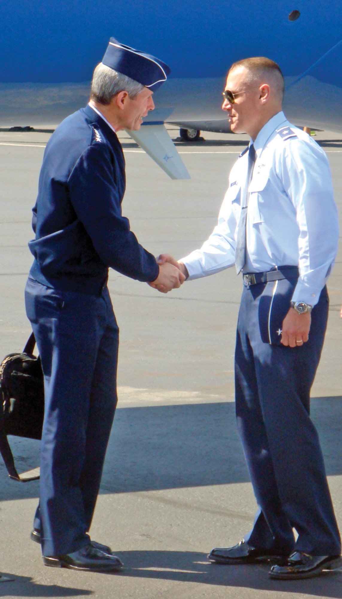 Gen. Kurt Neubauer, 56th Fighter Wing commander, greets Gen. Norton Schwartz, Air Force Chief of Staff, after his arrival into Phoenix Sky Harbor Airport Sunday. General Schwartz was guest speaker at the Arizona State University ROTC Det. 25 Arnold Air Society and Silver Wings Chapter military ball. (U.S. Air Force photo/ Rusty Mitchell)