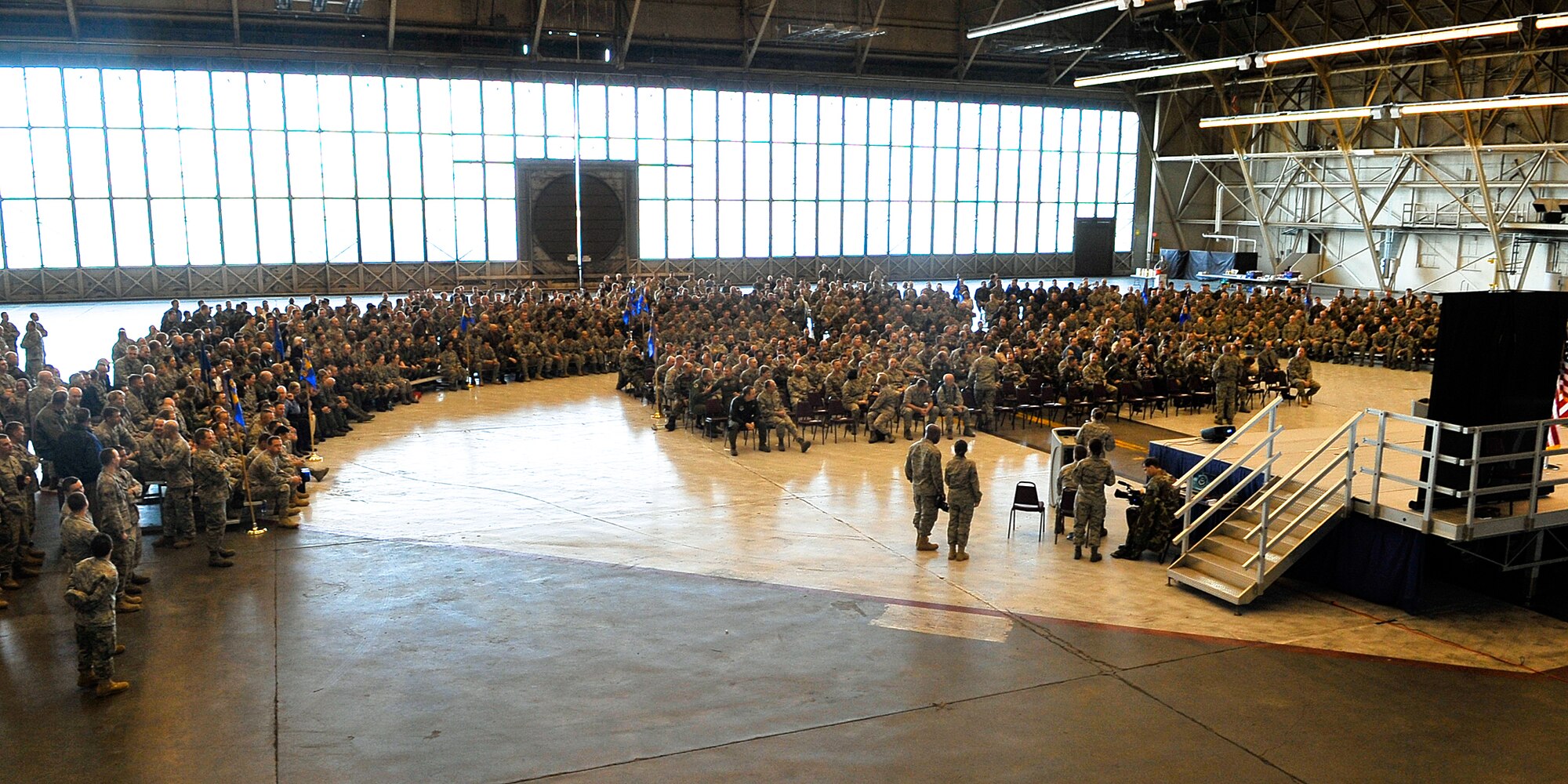Members of Team Fairchild unify in an aircraft hangar awaiting the results from the operational readiness inspection in March. The Inspector General applauded both the 92nd and the 141st Air Refueling Wings on a “job well done,” April 9. (U.S. Air Force photo / Senior Airman Joshua K. Chapman)  