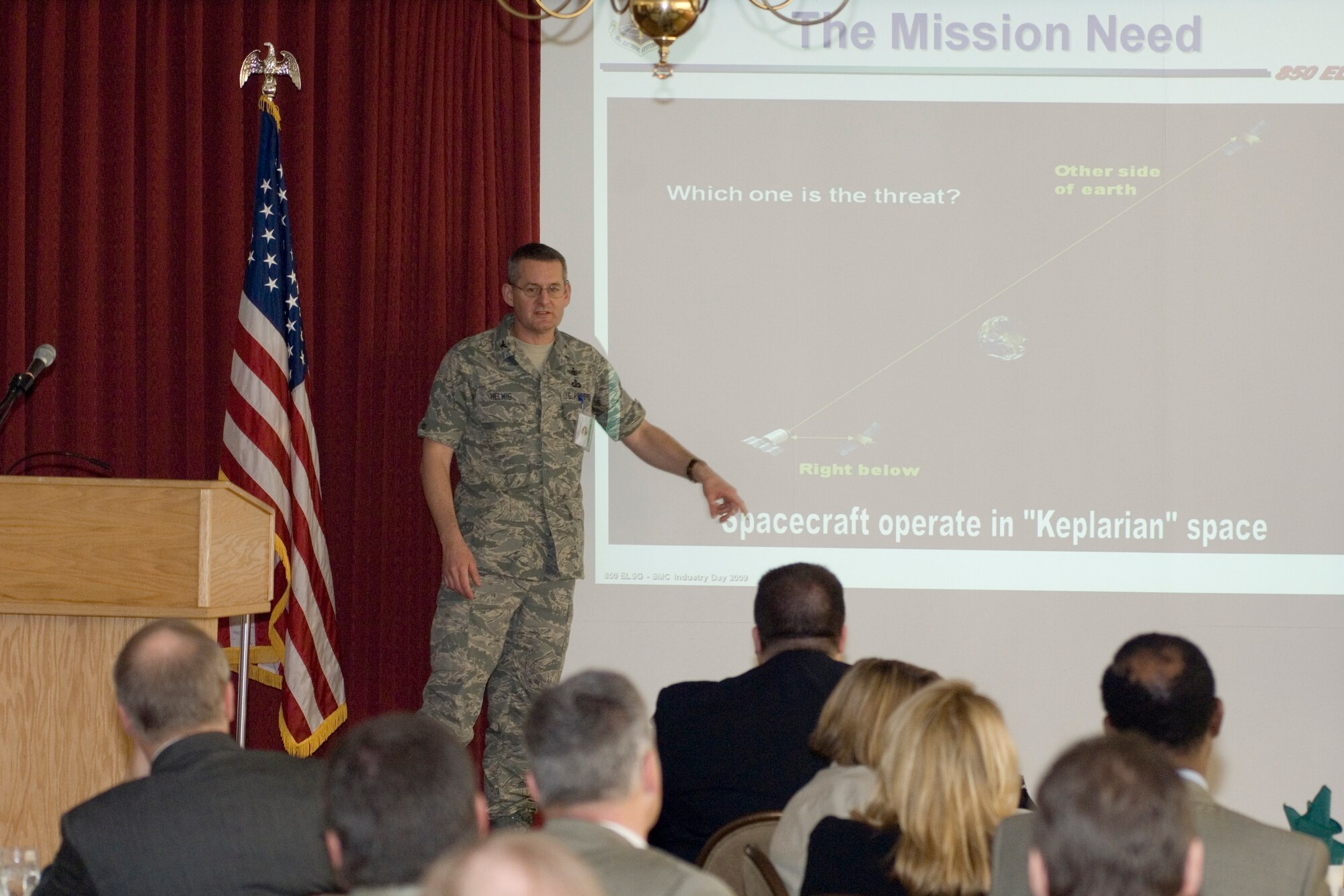 Col. Chuck Helwig of the 850th Electronic Systems Group discusses Joint Space Operations Center challenges while briefing members of the Hanscom Representatives Association during their monthly luncheon meeting at the Minuteman Club Wednesday. (USAF Photo by Rick Berry)
