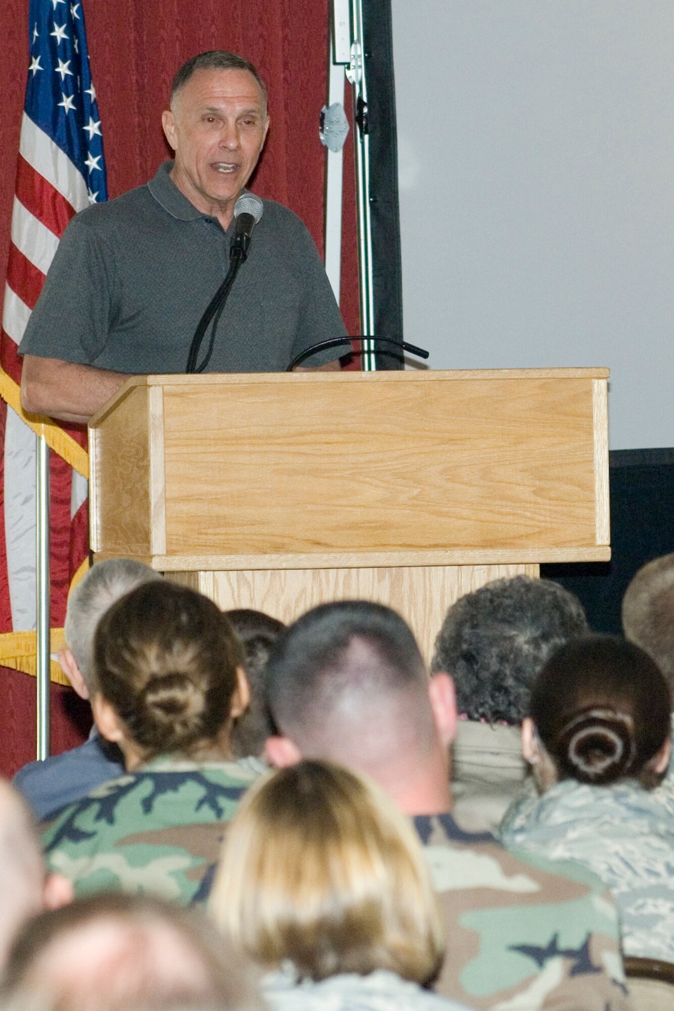 Retired Air Force Chief Master Sgt. Wayne Fisk recounts his Vietnam-era experience to a packed crowd at the Minuteman Club during the April 15 Heritage of Freedom speaker series. The series is a quarterly event that features three speakers, each of whom discuss their experiences serving in combat or while deployed. (USAF Photo by Rick Berry)
