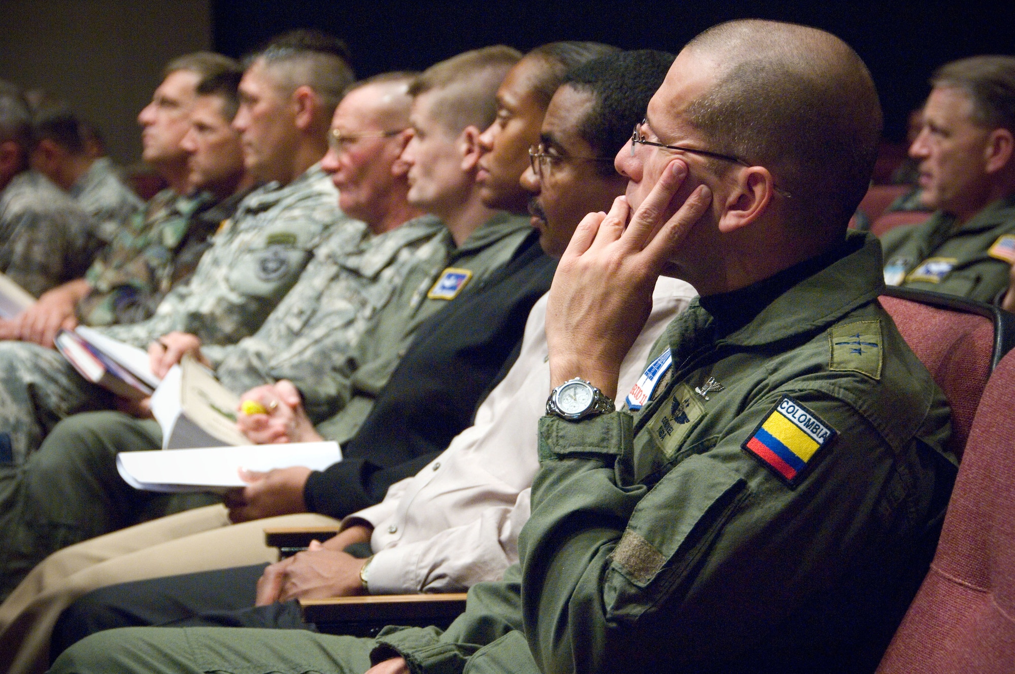 Air War College students listen as Adm. Thad Allen, U.S. Coast Guard commandant, speaks about homeland security April 9. The admiral's address was part of the Air War College Distinguished Lecture Series. Under the program, leaders from across a wide range of disciplines, including diplomats and scholars, speak on a regular basis to Air War College students. (U.S. Air Force photo/Melanie Rodgers Cox) 