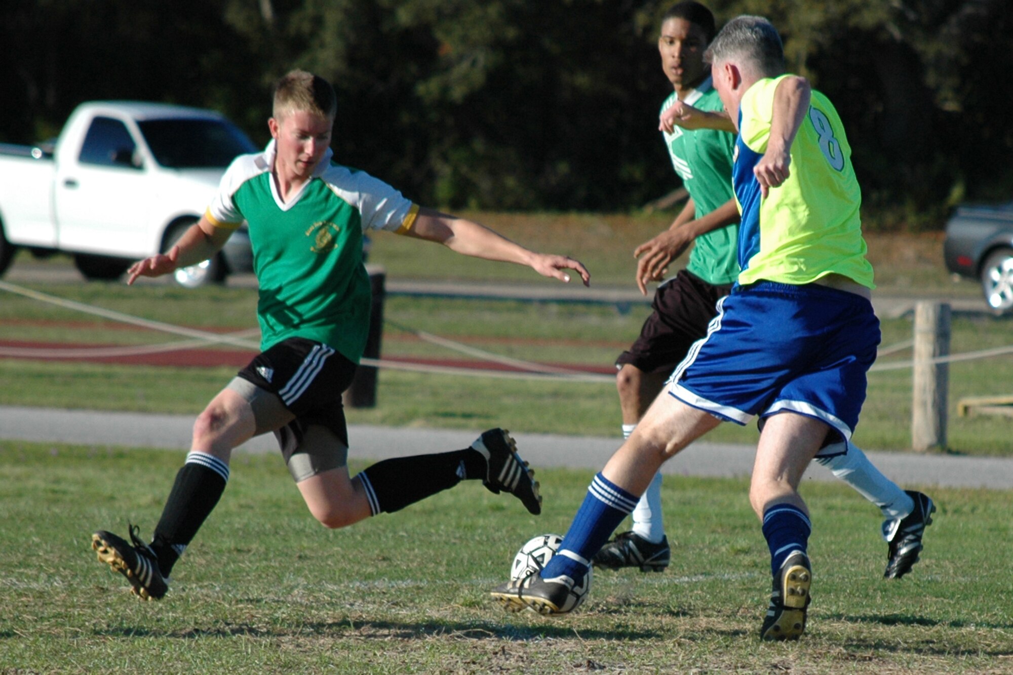 EGLIN AIR FORCE BASE, Fla. -- Airman Nikolas Kenna, 96th Civil Engineer Squadron, defends against a player from the 53rd Wing. The 53rd  and the 46th Test Wing earned the right to proceed to the 2009 Intramural Soccer Season championship game April 14, after both teams came out victorious in the season's playoff games. (U.S. Air Force photo/ Airman Anthony Jennings)