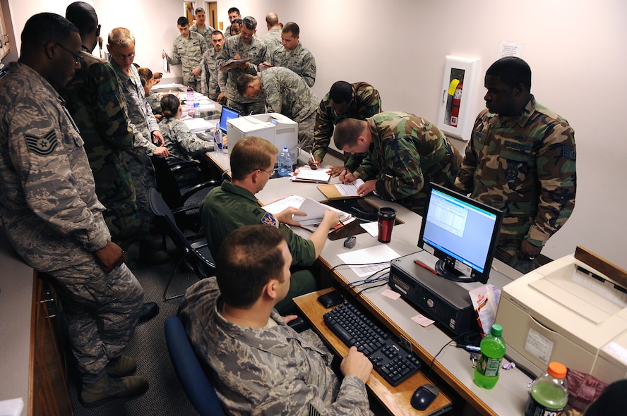 MOODY AIR FORCE BASE, Ga. -- Airmen process through a simulated deployment line during a Phase I Operational Readiness Exercise here April 14. The exercise tested Moody’s capability to rapidly deploy Airmen and assets in the event of a real-world tasking. (U.S. Air Force photo by Airman Joshua Green) 
