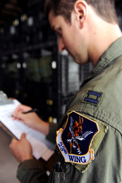 MOODY AIR FORCE BASE, Ga. -- Capt. Eric Fleming, 23rd Wing Operations Support Squadron chief trainee, fills out a hand receipt for a mobility bag during a Phase I Operational Readiness Exercise here April 13. During the ORE, individuals who were tasked to deploy were given a mobility bag before processing through the deployment line. (U.S. Air Force illustration by Airman Joshua Green) 